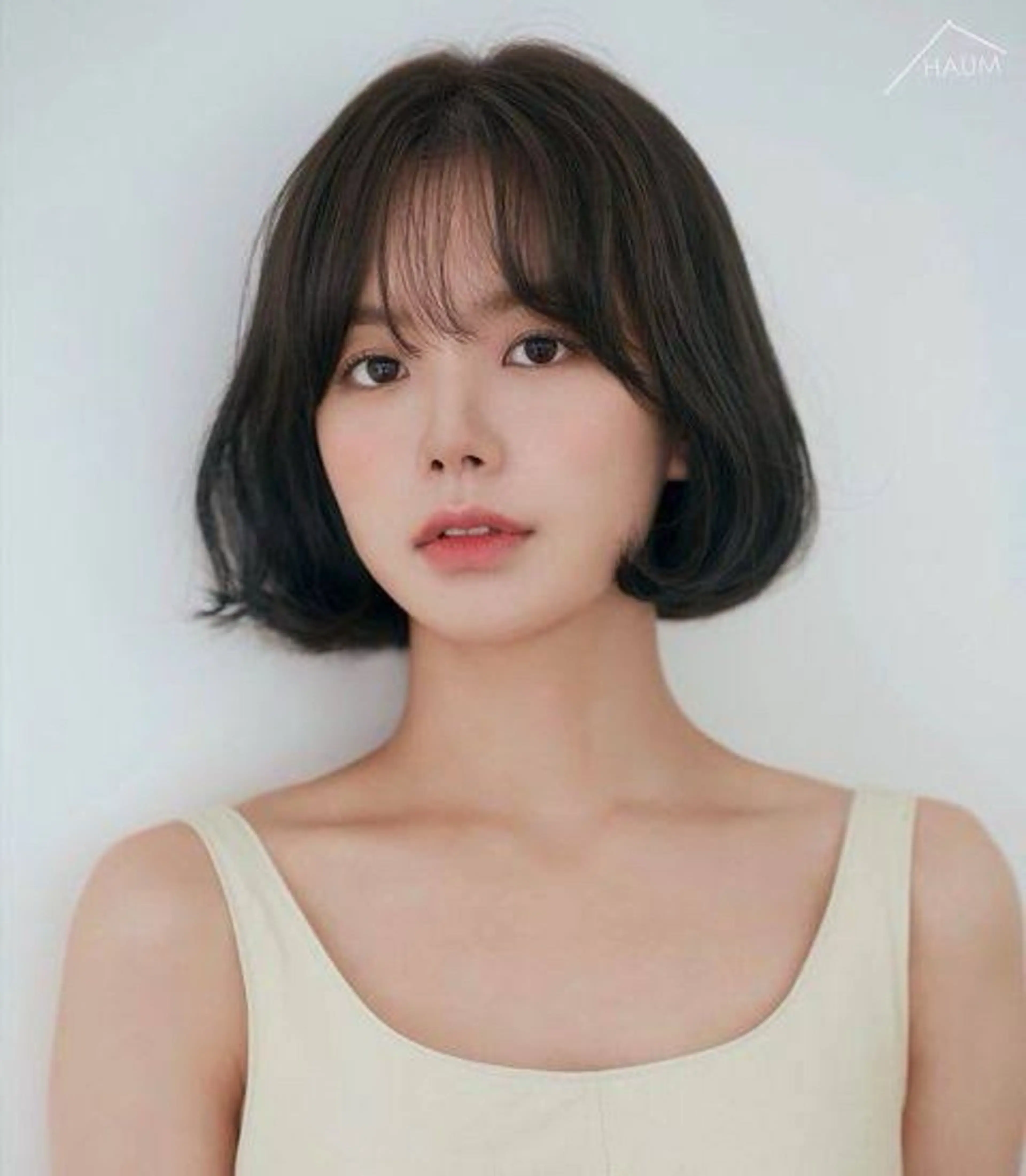 【立体感×抜け感】ショートでも映える韓国風コテ巻きパーマ＋小顔レイヤーカットの写真