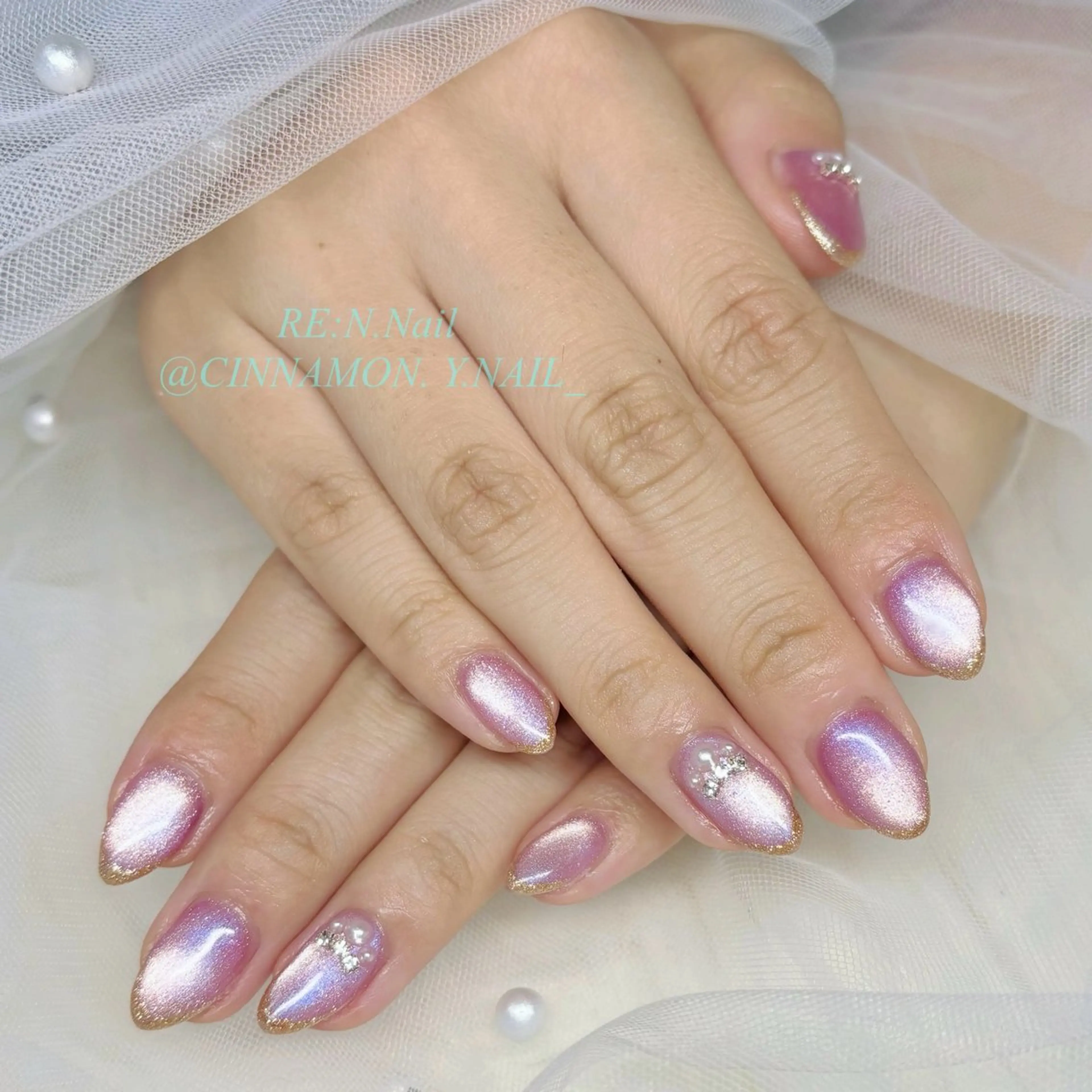 ネイル キラキラネイル ピンク ハンドネイル Yuna🩵 RE:N.Nailのネイルデザイン