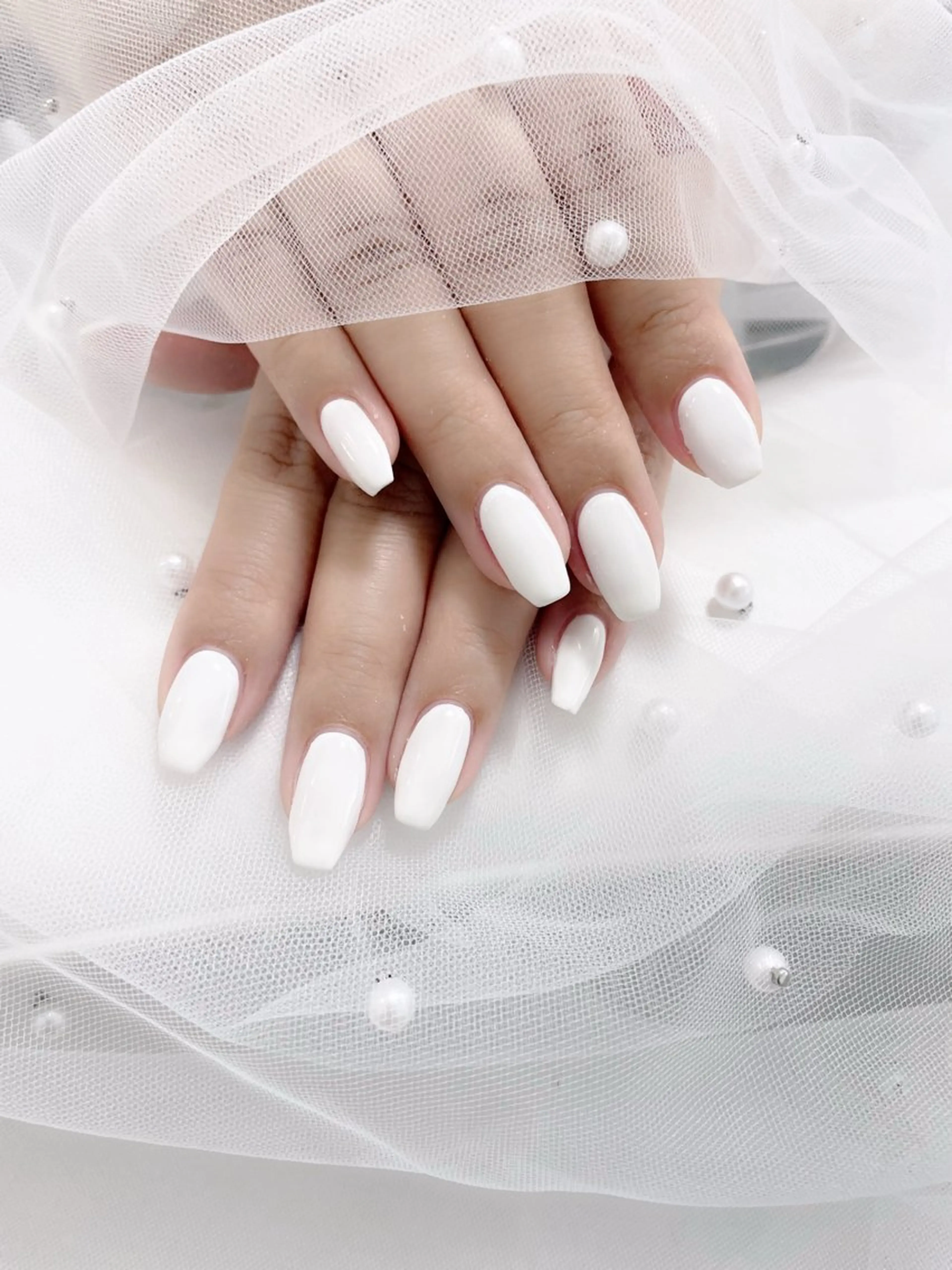 ネイル アートネイル オフィスネイル ワンカラーネイル シンプルネイル ホワイト まつ毛エクステ・まつげパーマ・パリジェンヌ専門店 miel Beauty 【ミエル】所属・。 minamiのネイルデザイン