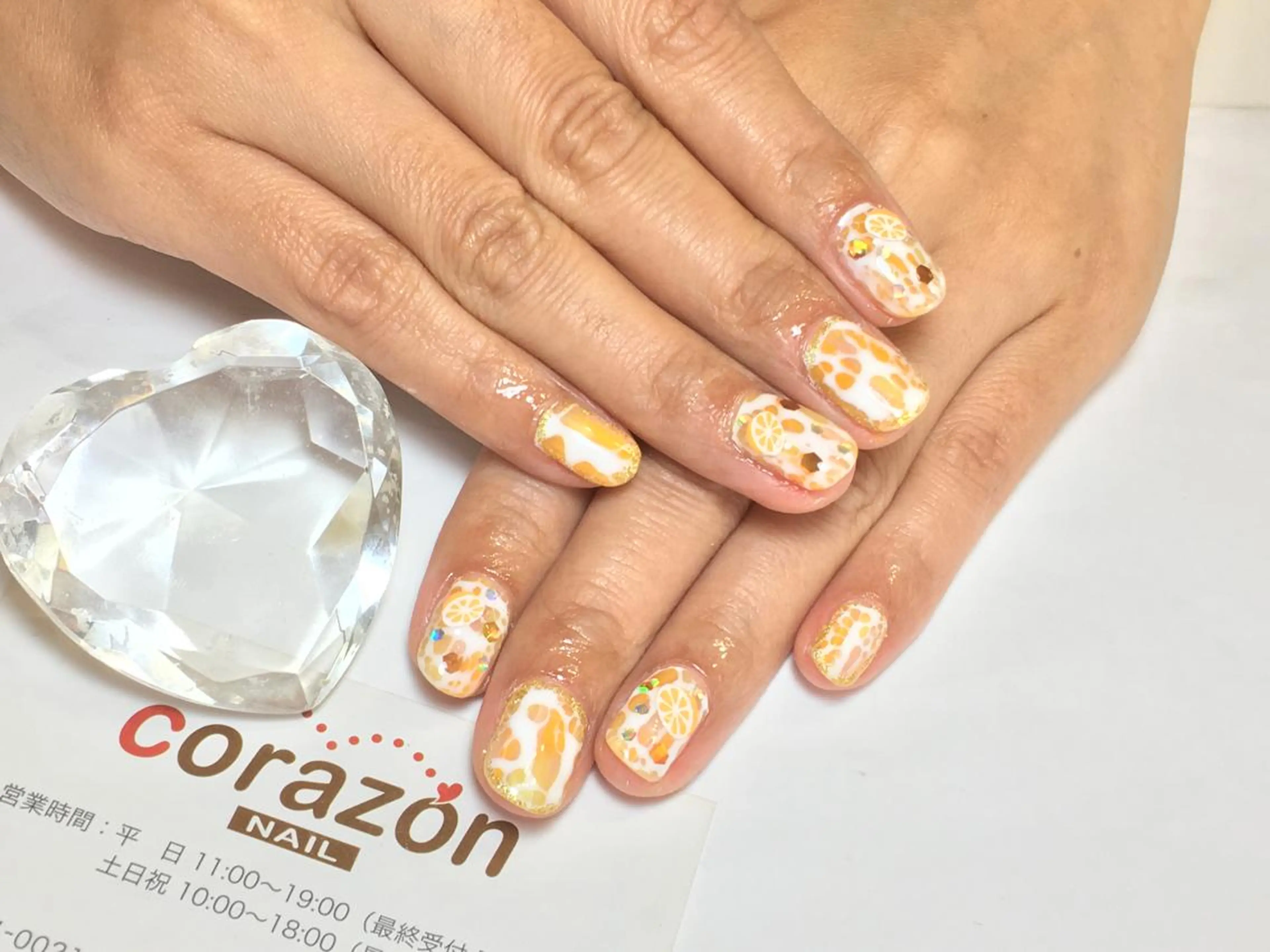 ネイル オレンジ ホワイト corazon所属・ネイリスト aicoのネイルデザイン