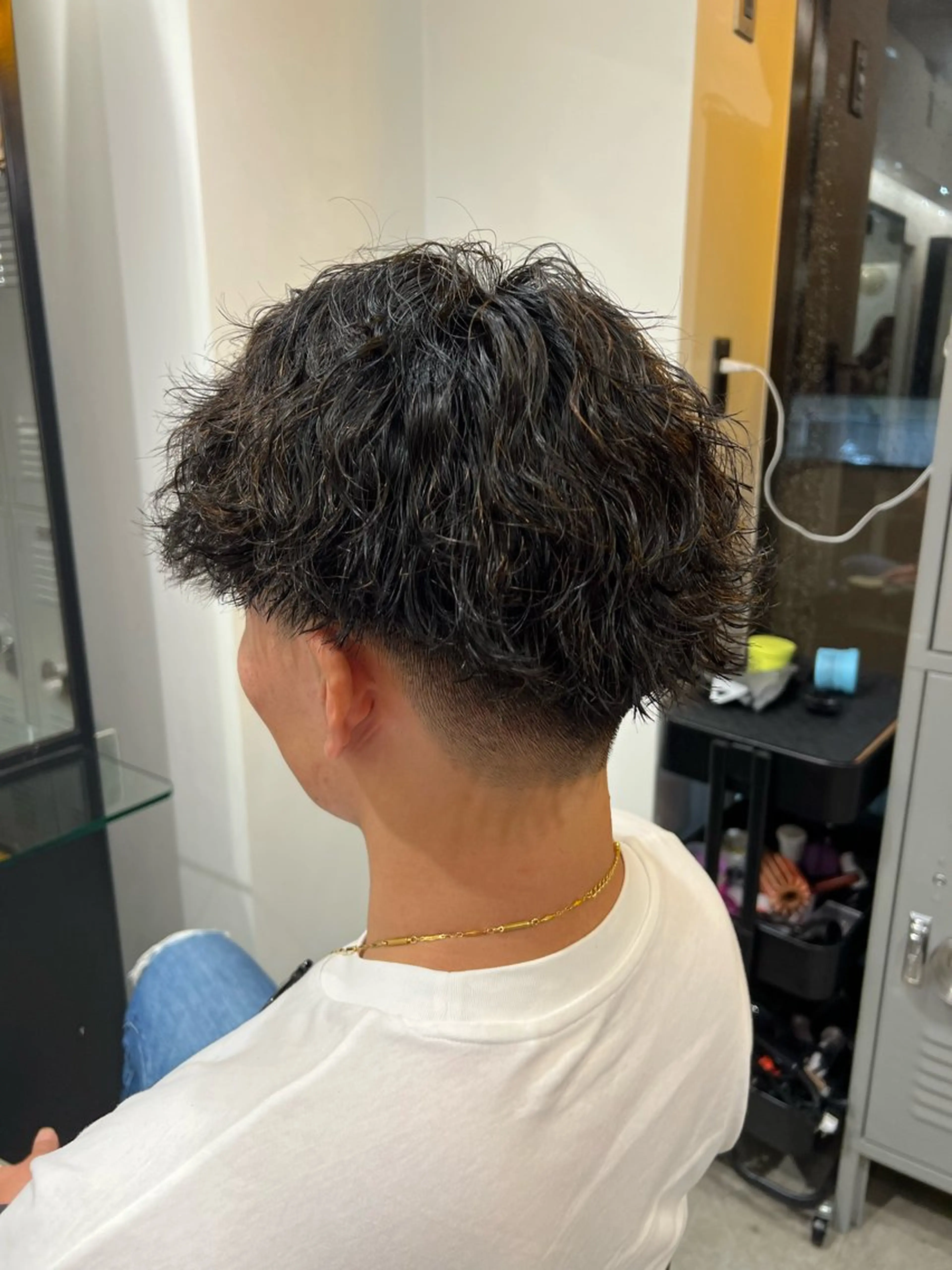 カット+波巻きスパイラルパーマの写真