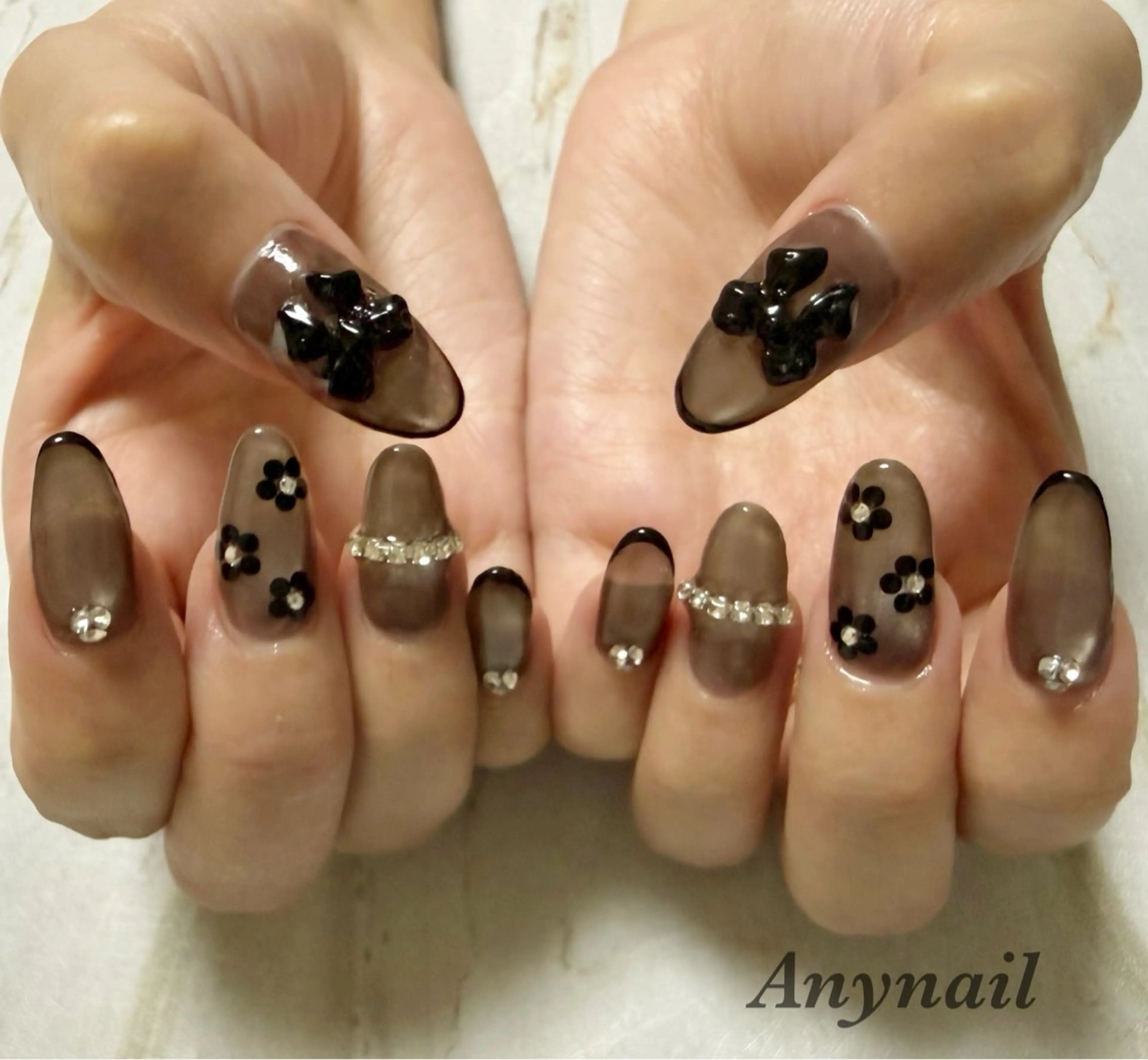 ネイル ブルー キラキラネイル マグネットネイル リボン ストーンネイル 岩澤 恵子のネイルデザイン