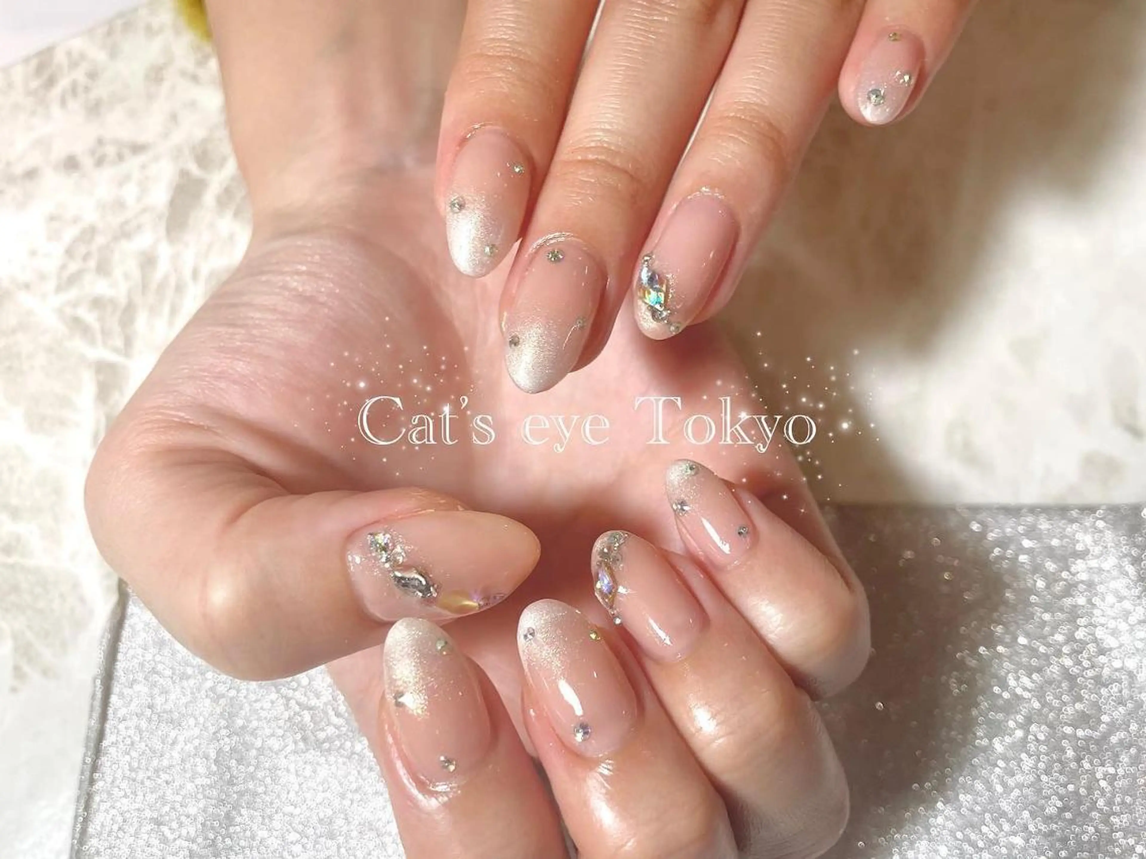 ネイル マツエク・マツパ アートネイル ストーンネイル Cat's eye TOKYO 新宿店のネイルデザイン