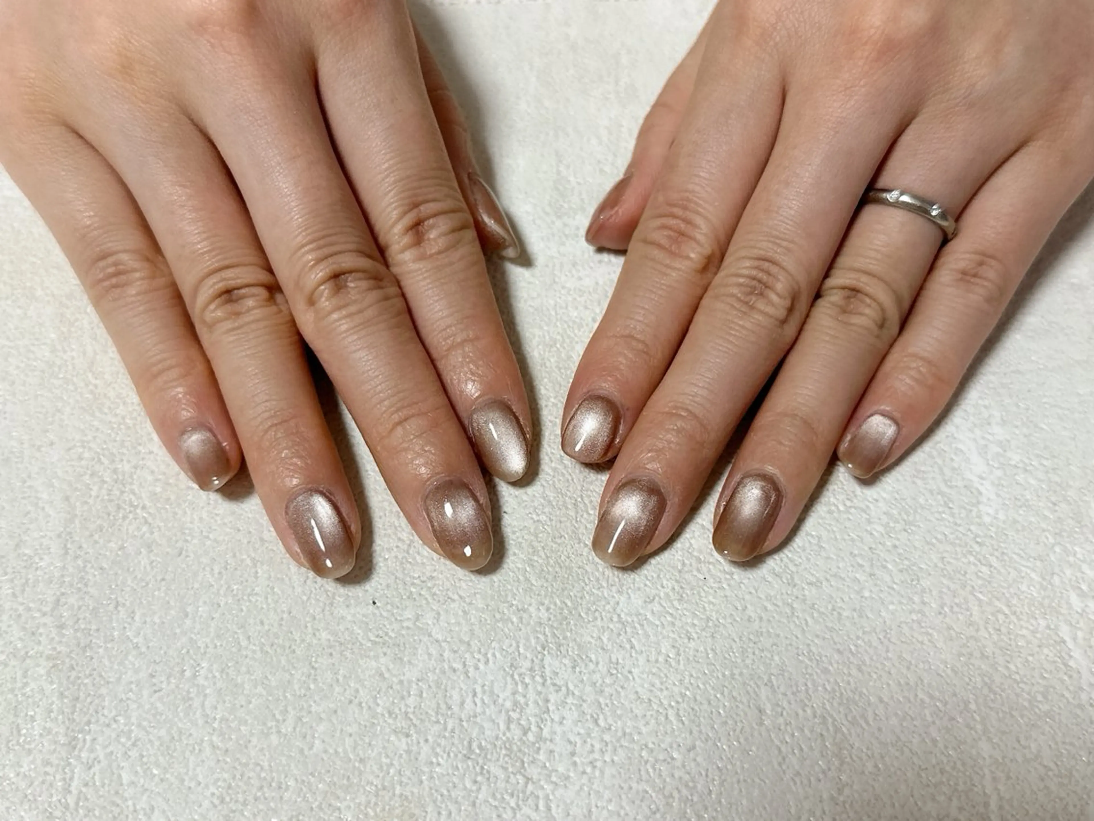 ネイル オーロラネイル ブラウン 桜ネイル フラワーネイル フットネイル mogunail &blowのネイルデザイン