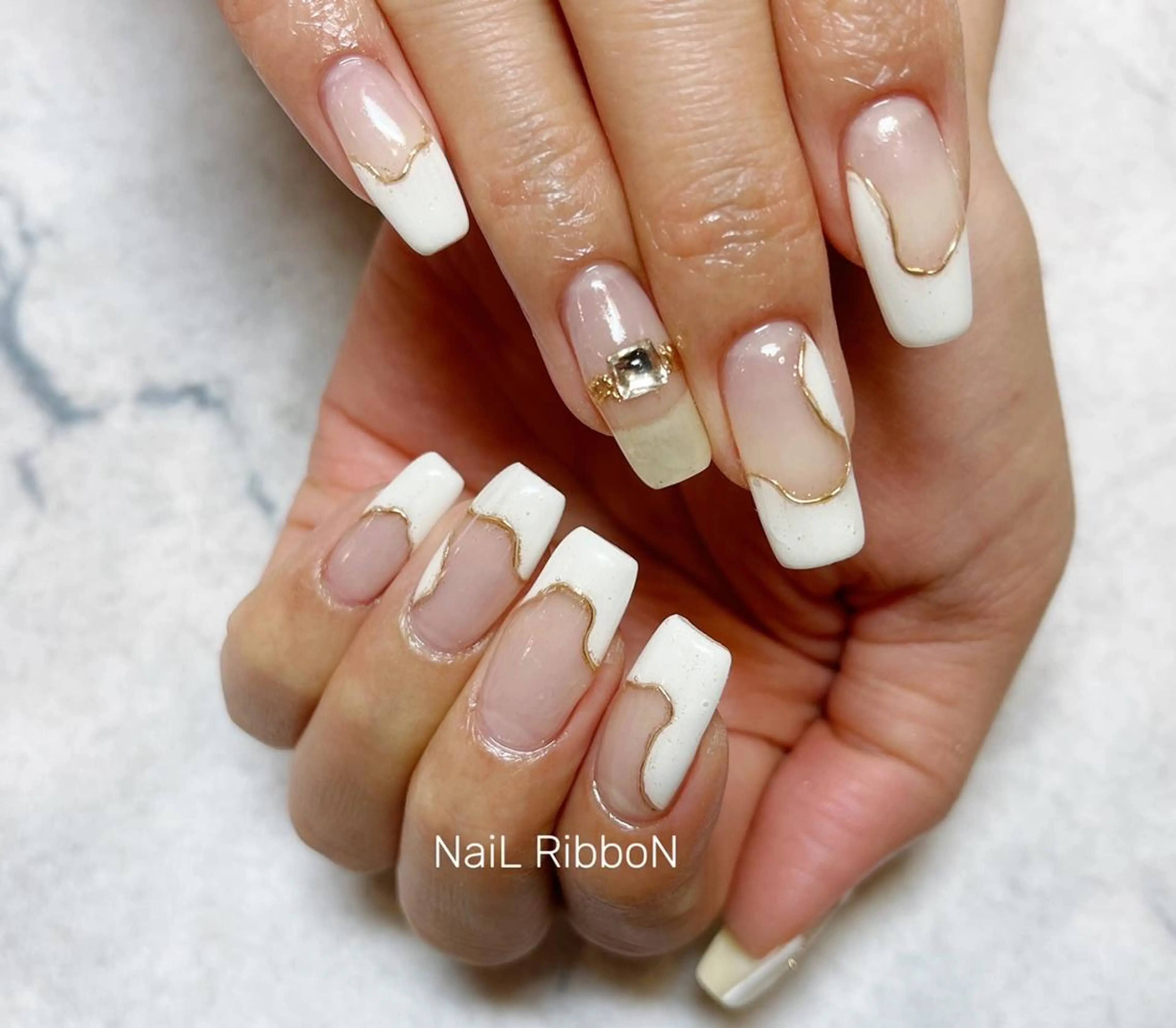 ネイル ネイルリボン 受付スタッフのネイルデザイン