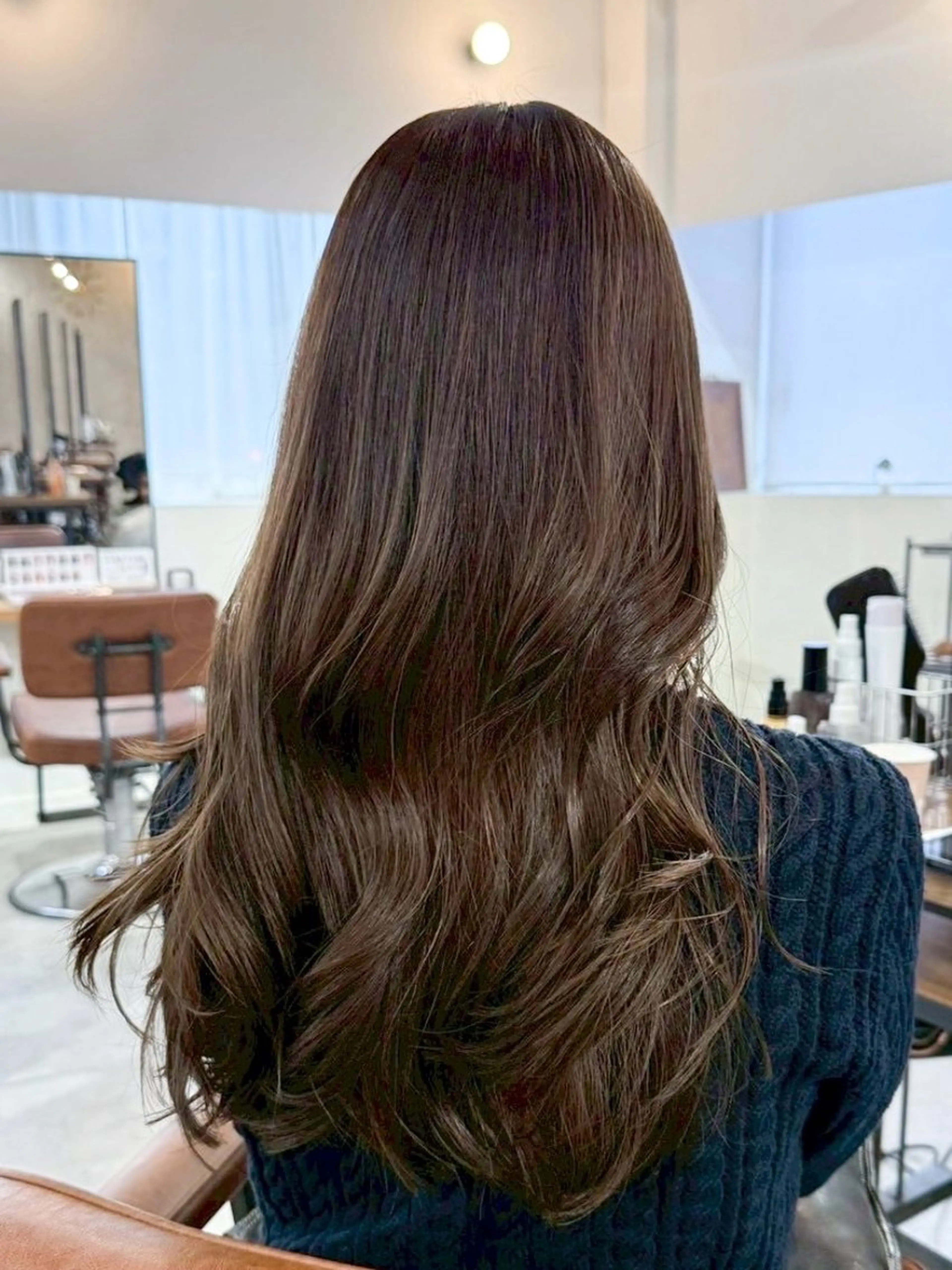 ロング ダメージレスの縮毛 矯正ブリーチMICOのヘアスタイル