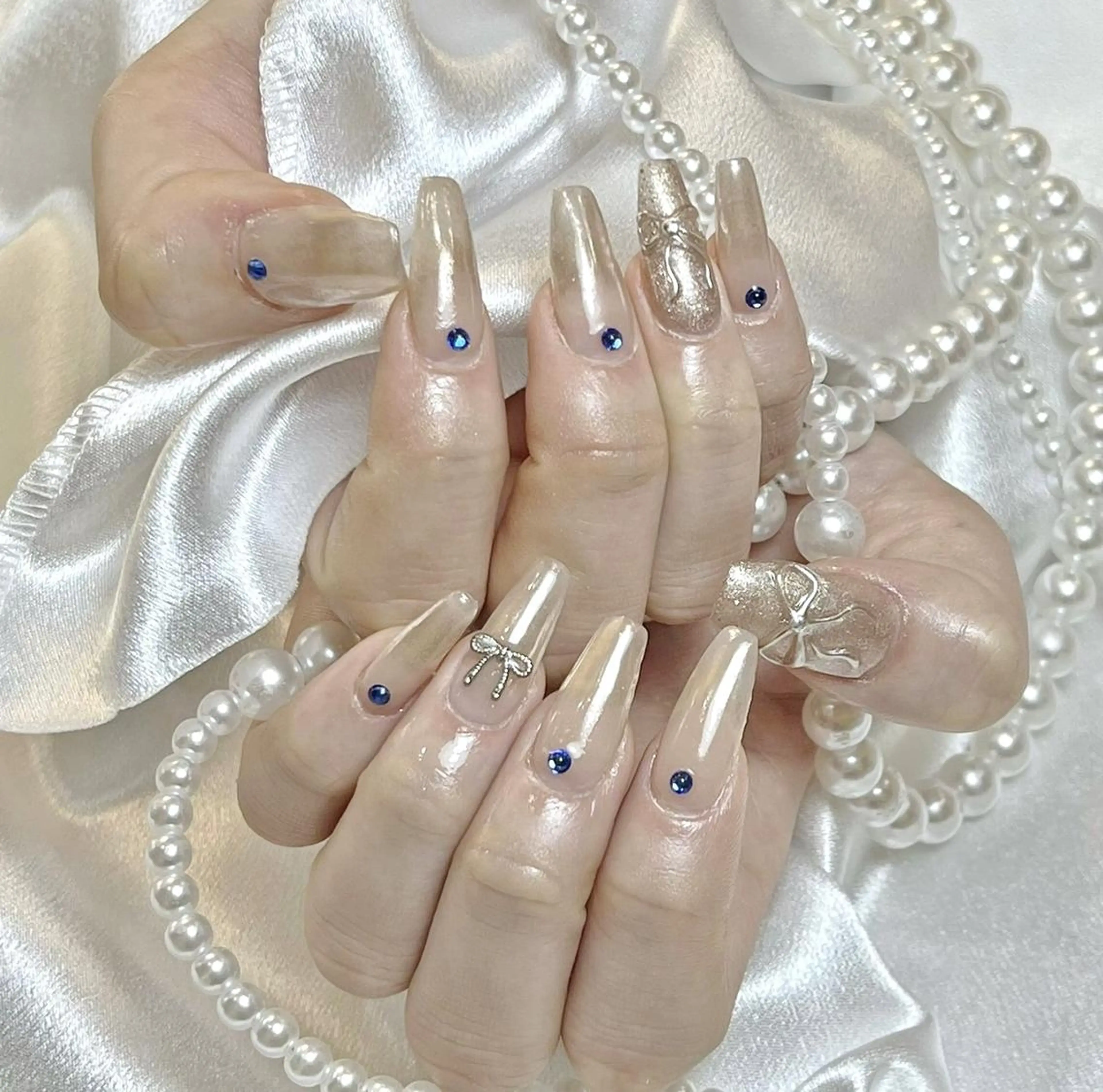 ネイル RAFFINE 月🦋🩵のネイルデザイン