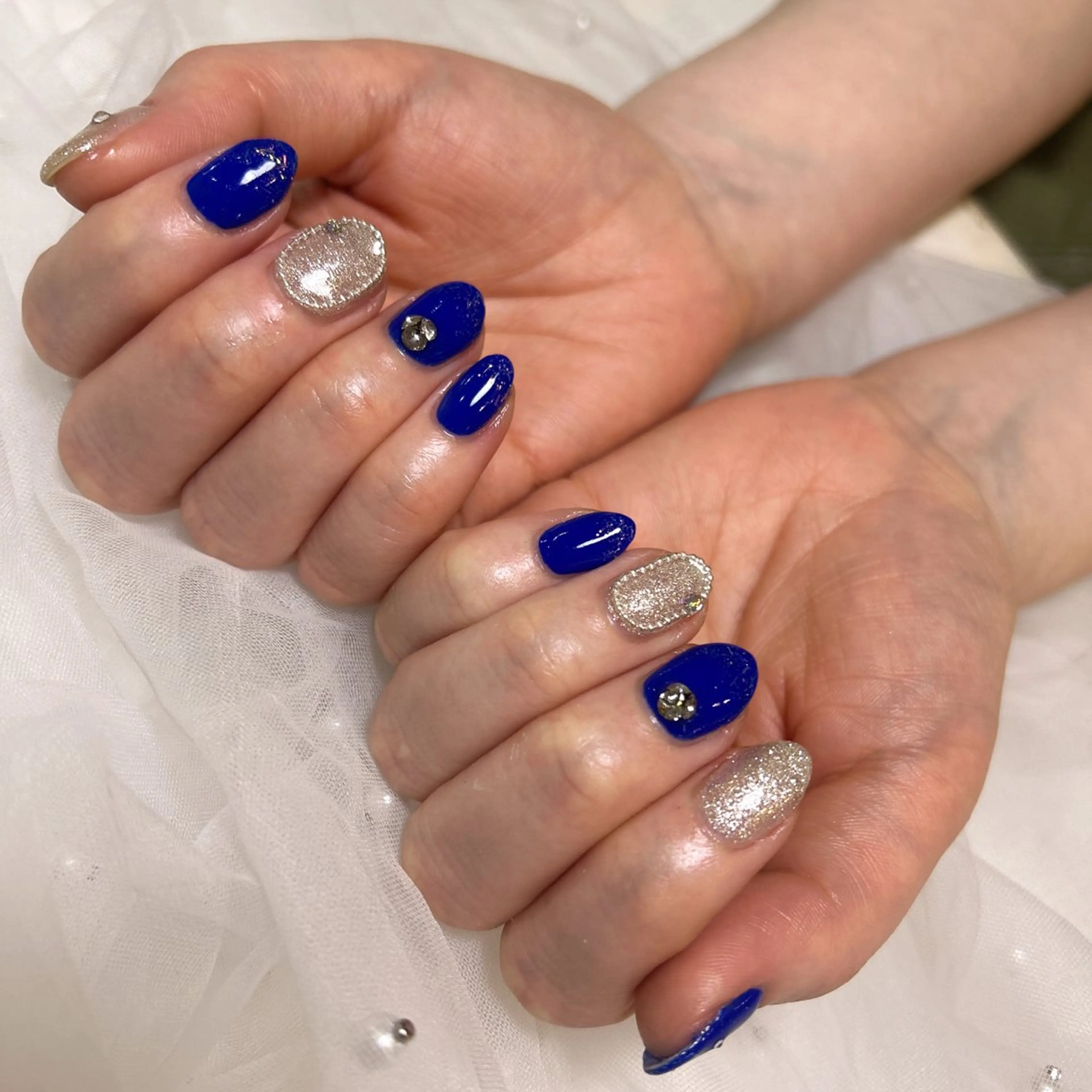 ネイル ブルー キラキラネイル EmaNail天満橋店所属・EmaNail Risaのネイルデザイン