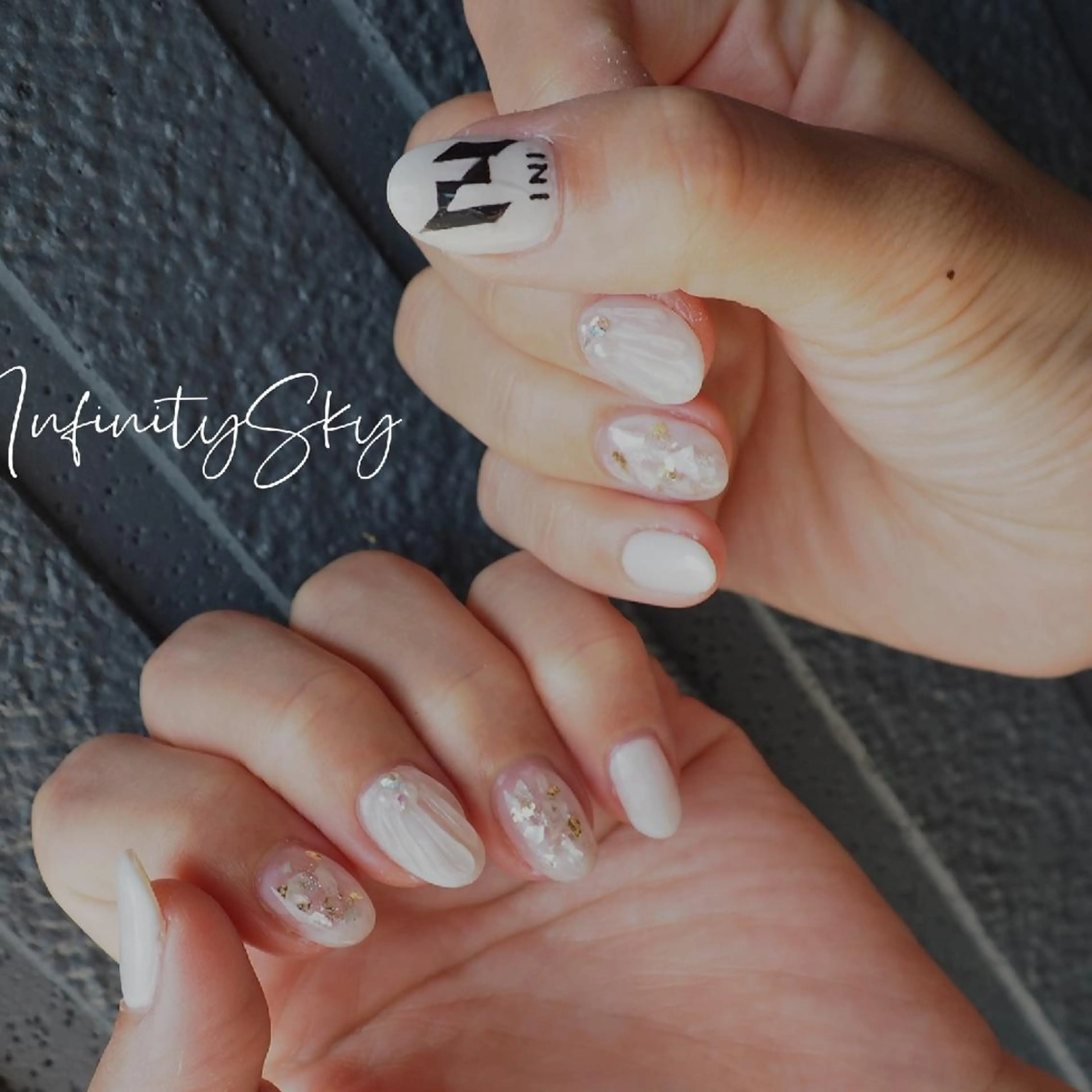 ネイル ホワイト infinity skyのネイルデザイン