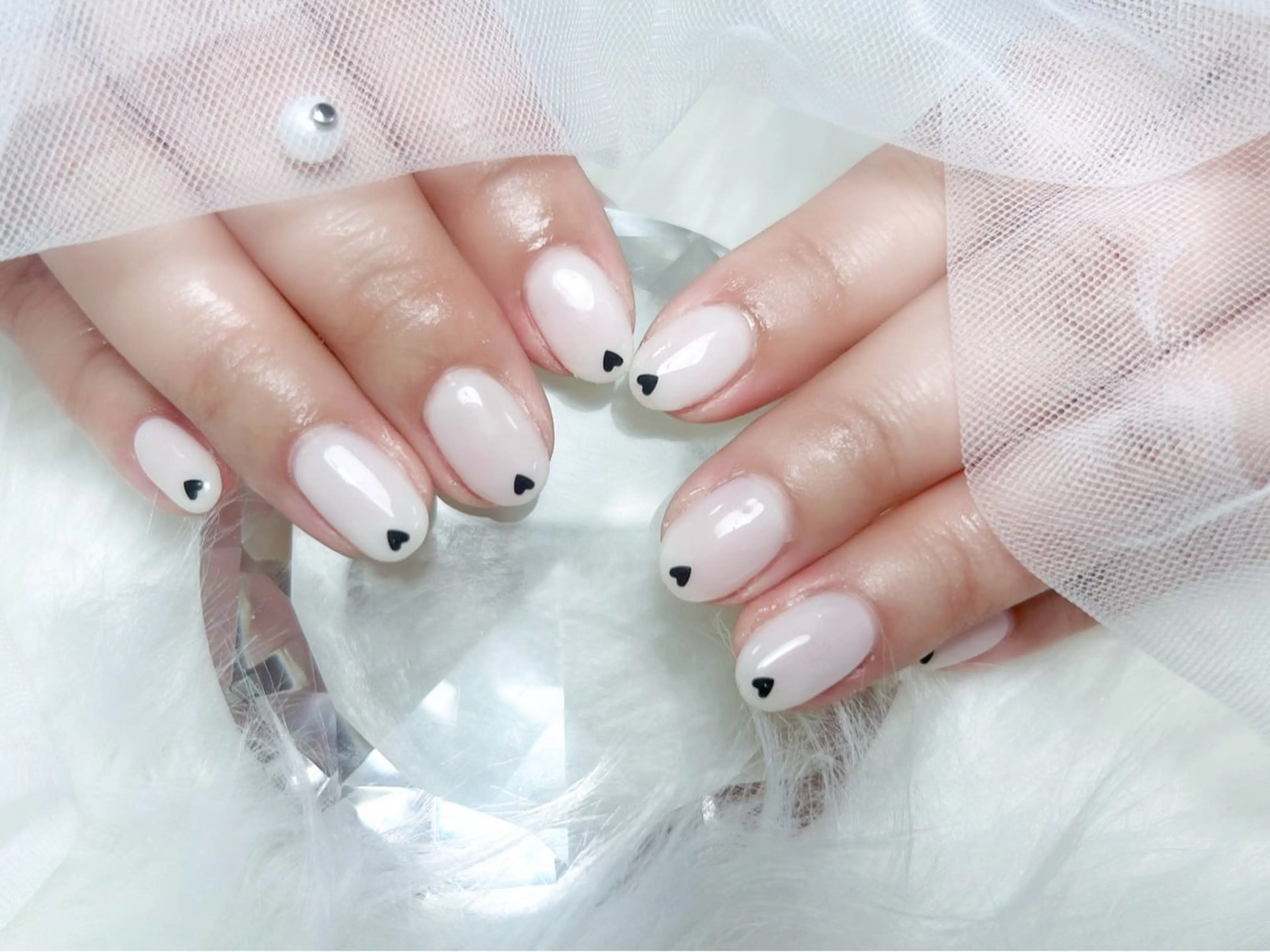 ワンカラーorラメ＋先端ハートホログラムの写真