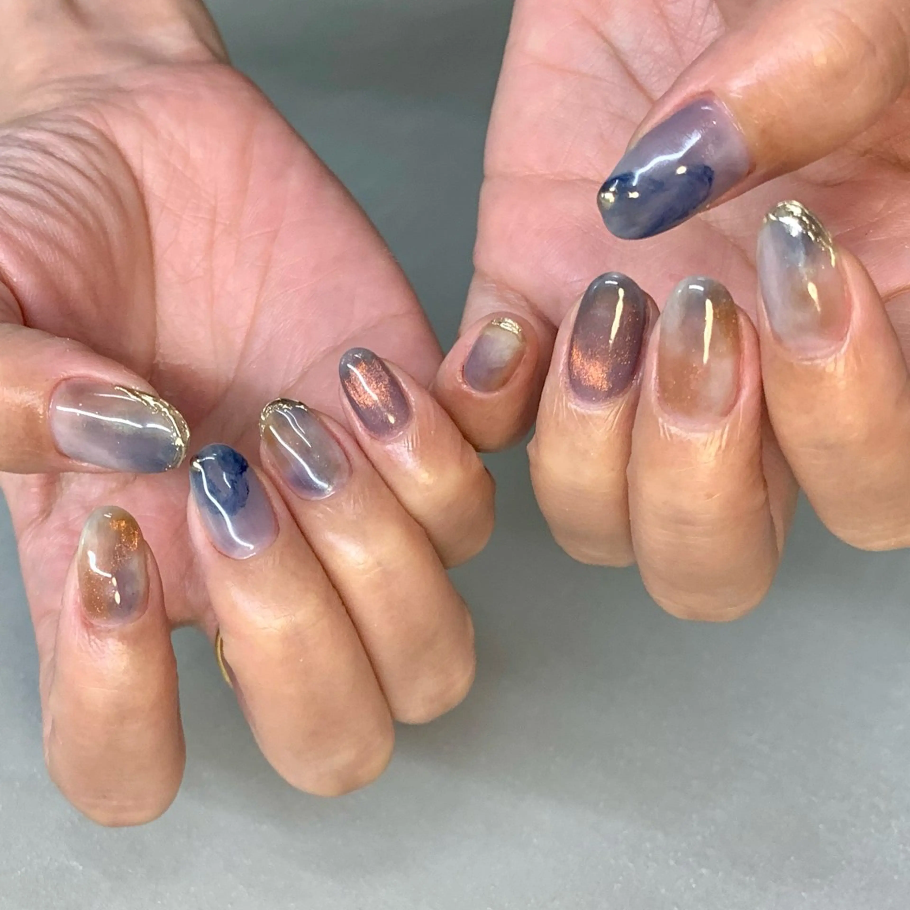 ネイル ブルー ブラウン マグネットネイル ミラーネイル オレンジ ハンドネイル Garland  nail所属・Garland makotoのネイルデザイン