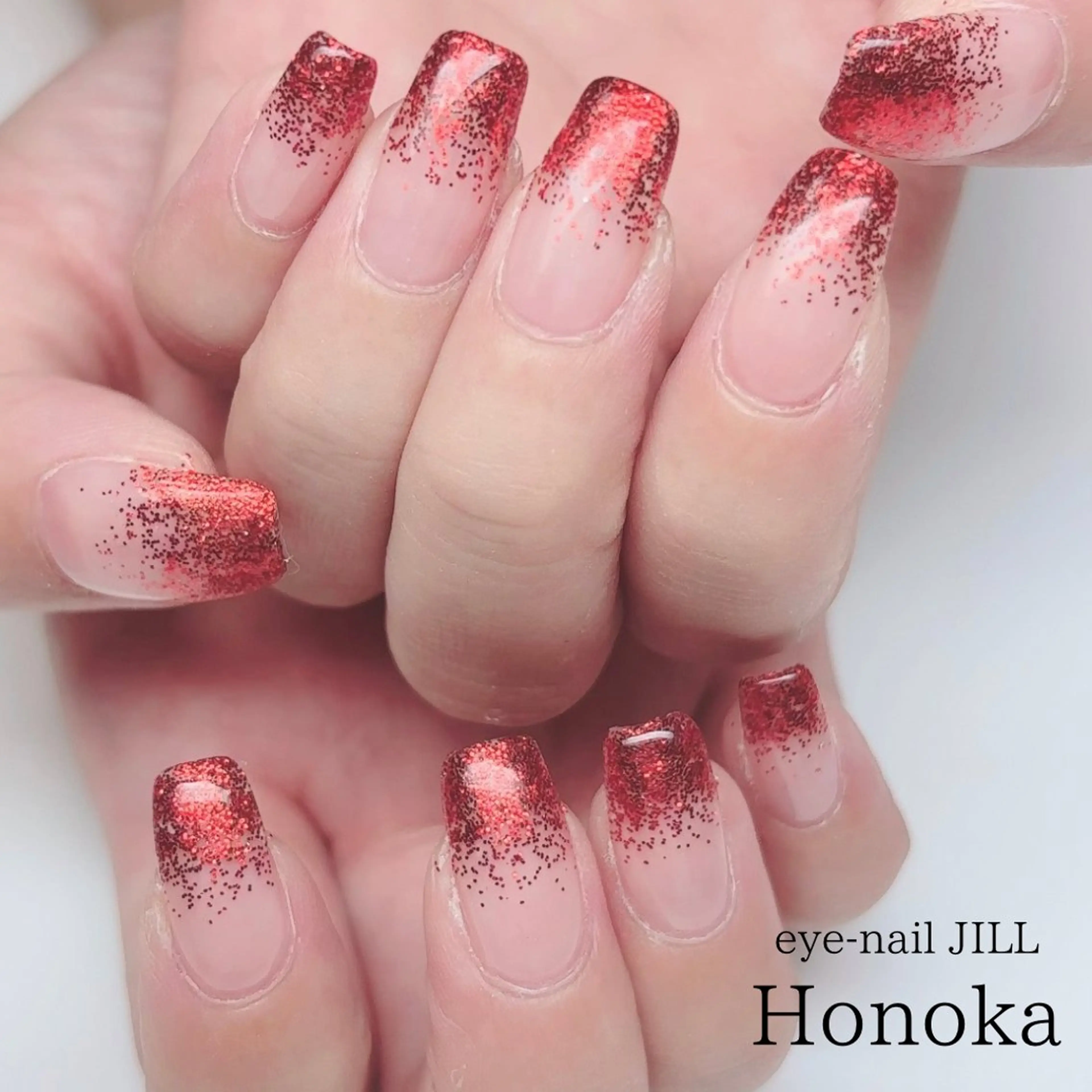 ネイル グラデーション ラメ(グリッター) ラメグラデーション 赤色 ハンドネイル JILL Honokaのネイルデザイン