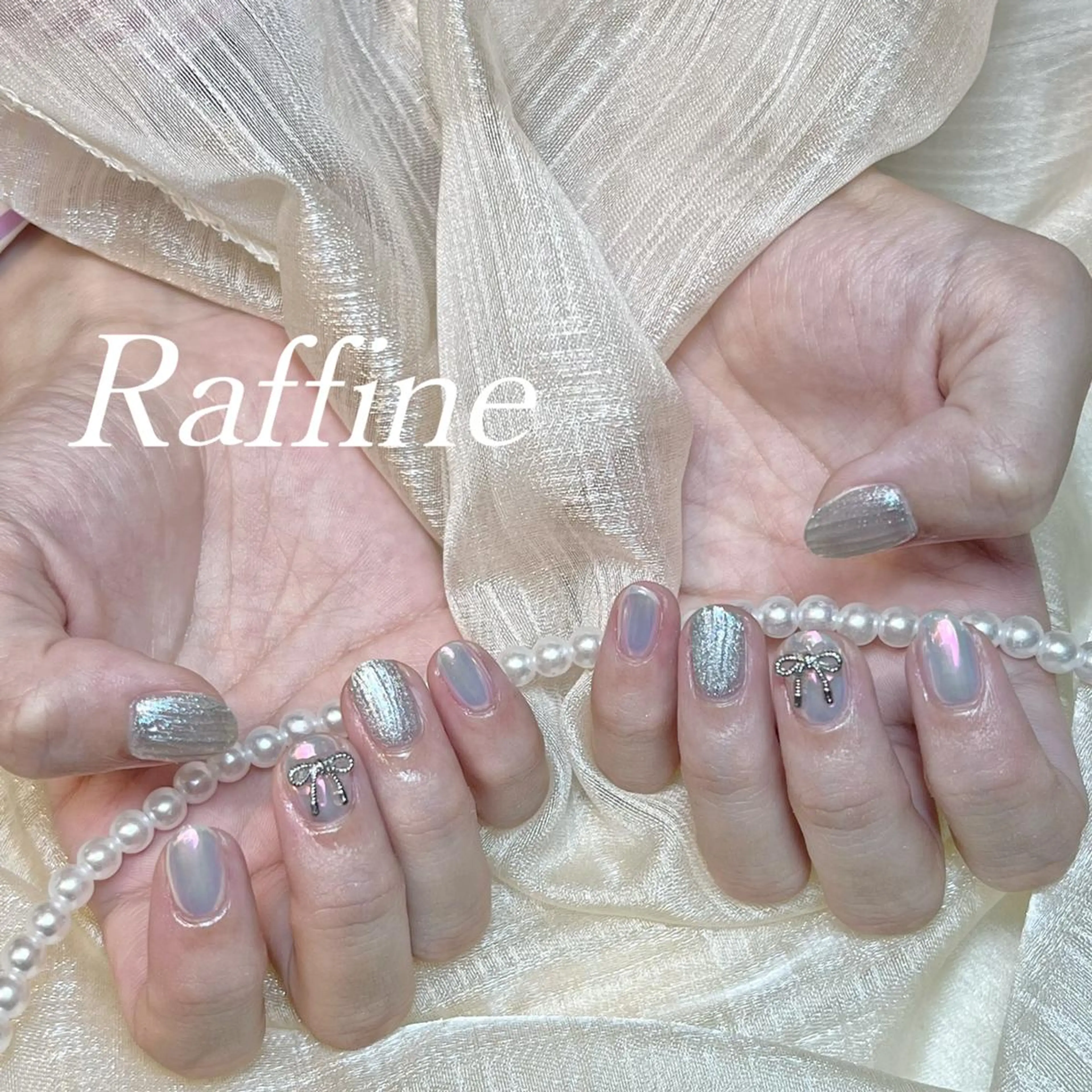 ネイル ハンドネイル RAFFINE 月🦋🩵のネイルデザイン