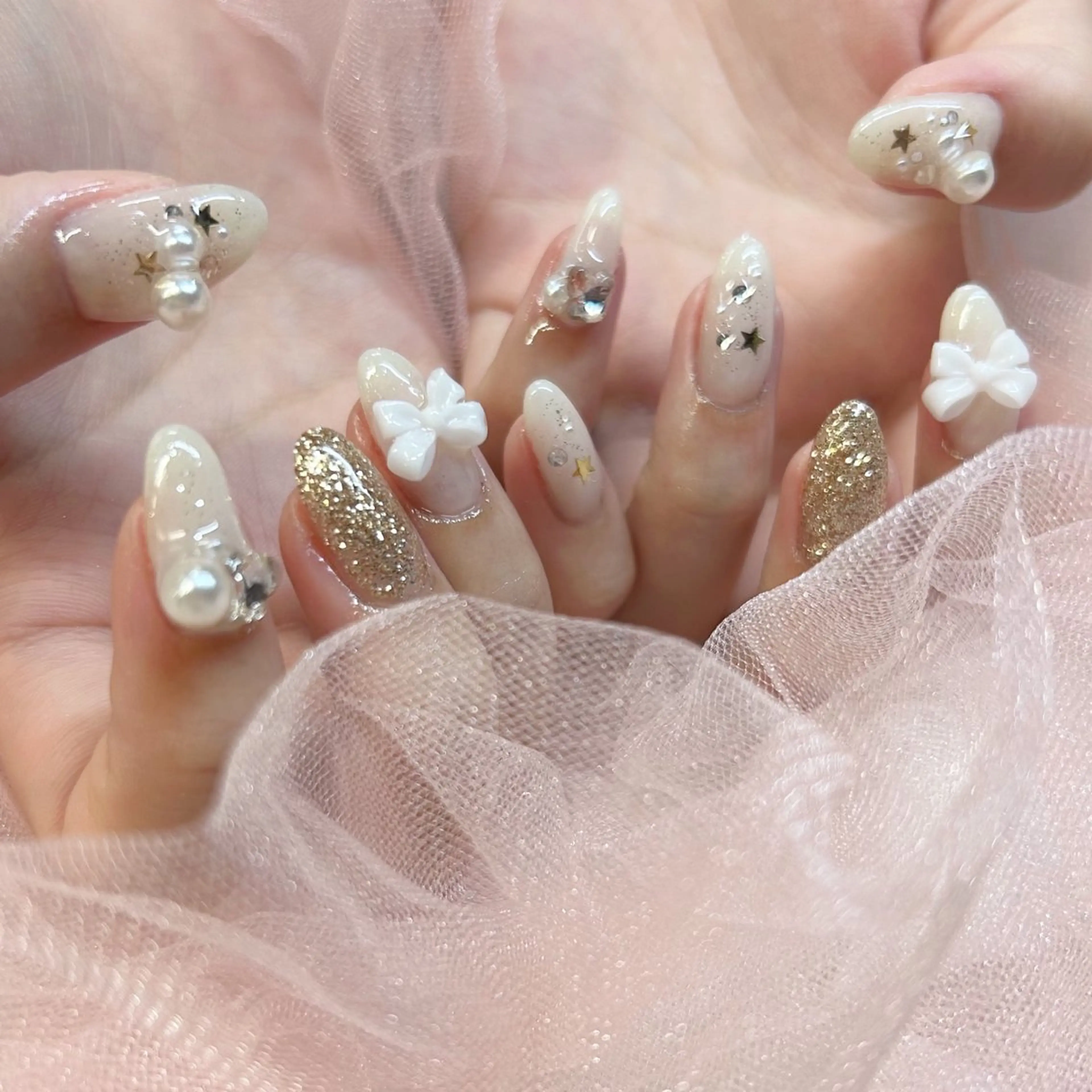 ネイル ゴールド ラメ(グリッター) 冬ネイル クリスマス EMANON心斎橋店所属・大阪心斎橋ネイル/ hinataのネイルデザイン
