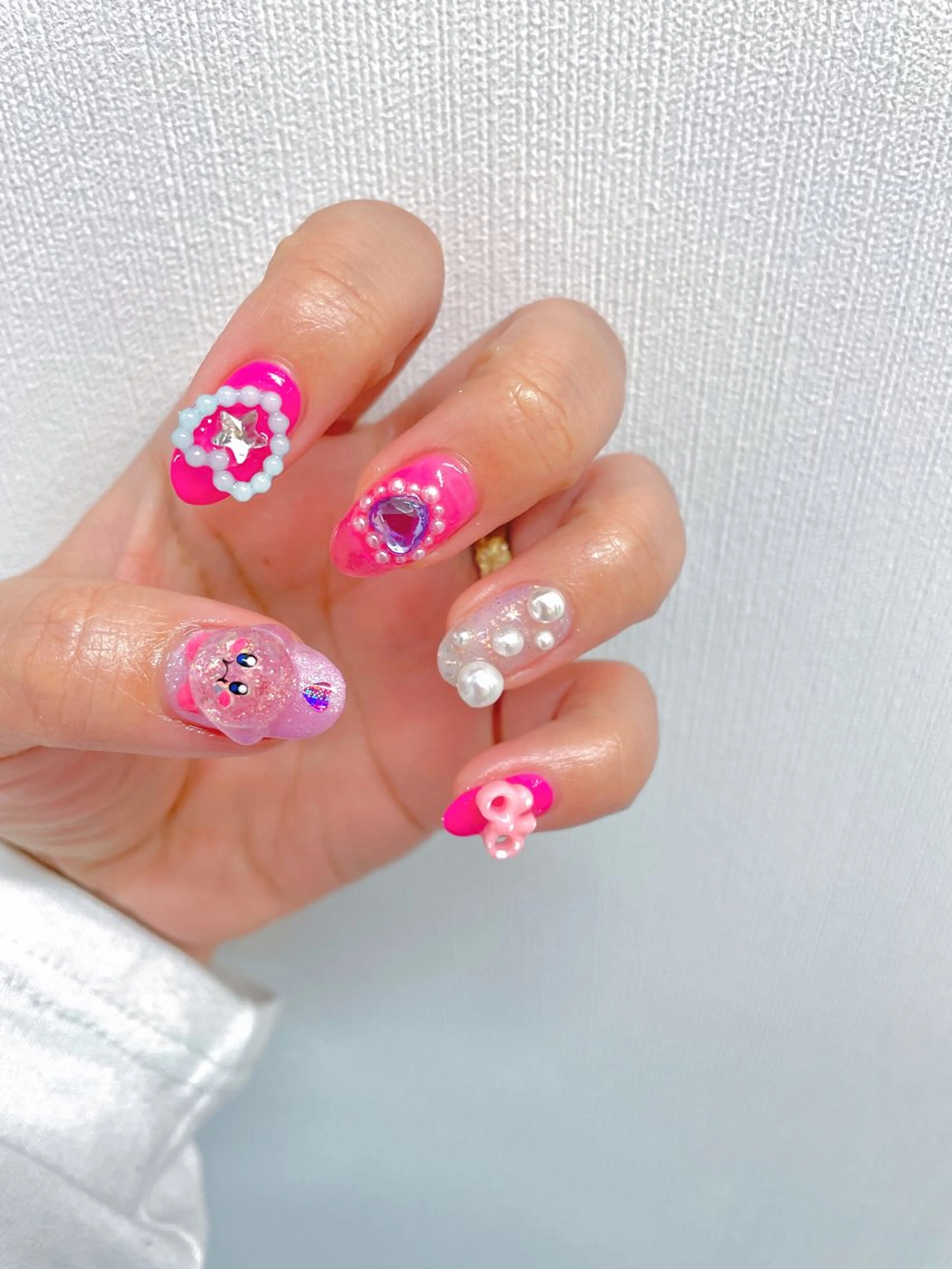 ネイル ハンドネイル OKIKA所属・【OKIKA】 らん🦖🌈🧡のマツエク・マツパデザイン