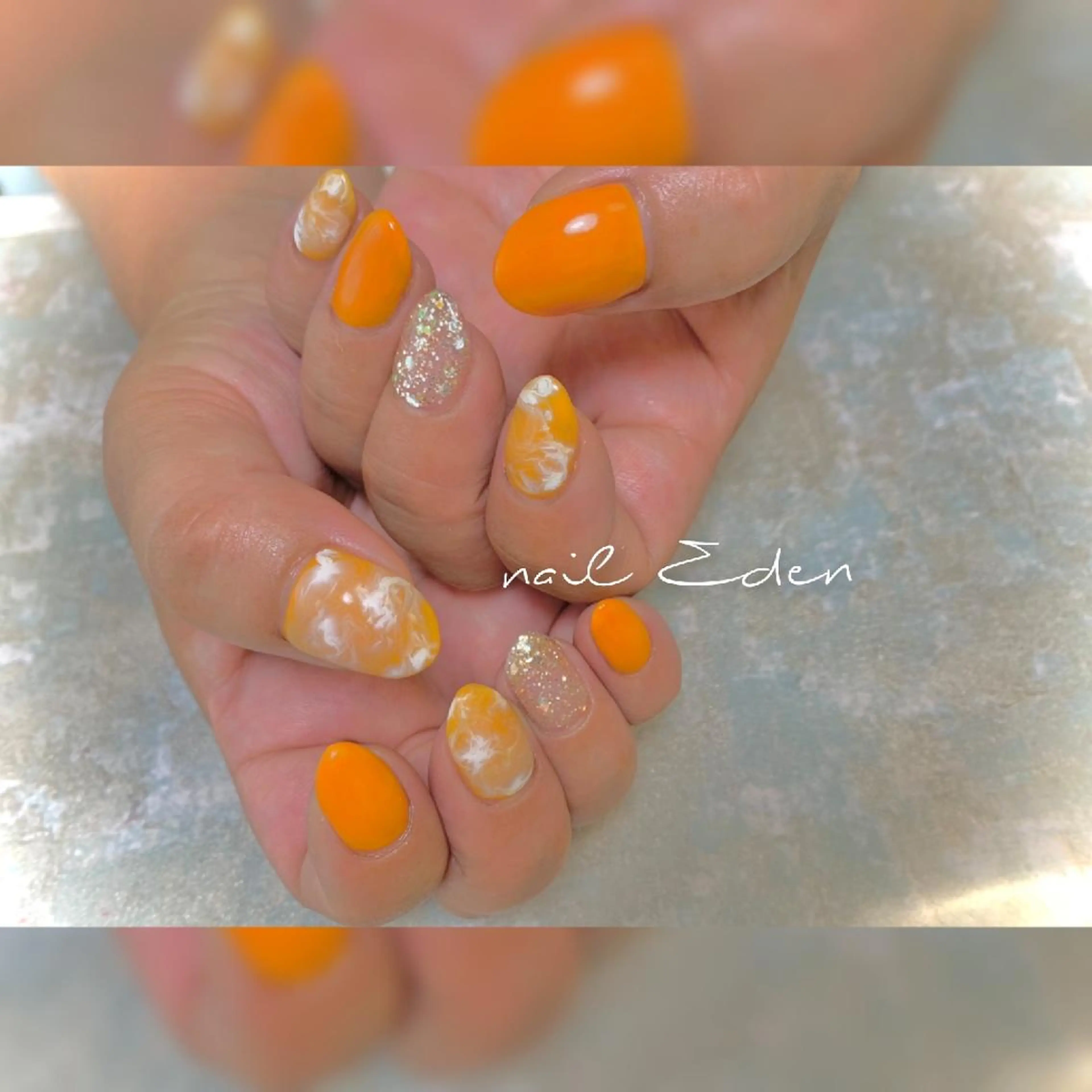 ネイル 大理石ネイル(マーブル) 持ち込み オレンジ ハンドネイル ハンドケア Eden　private nail saron所属・Eden ♾️のネイルデザイン