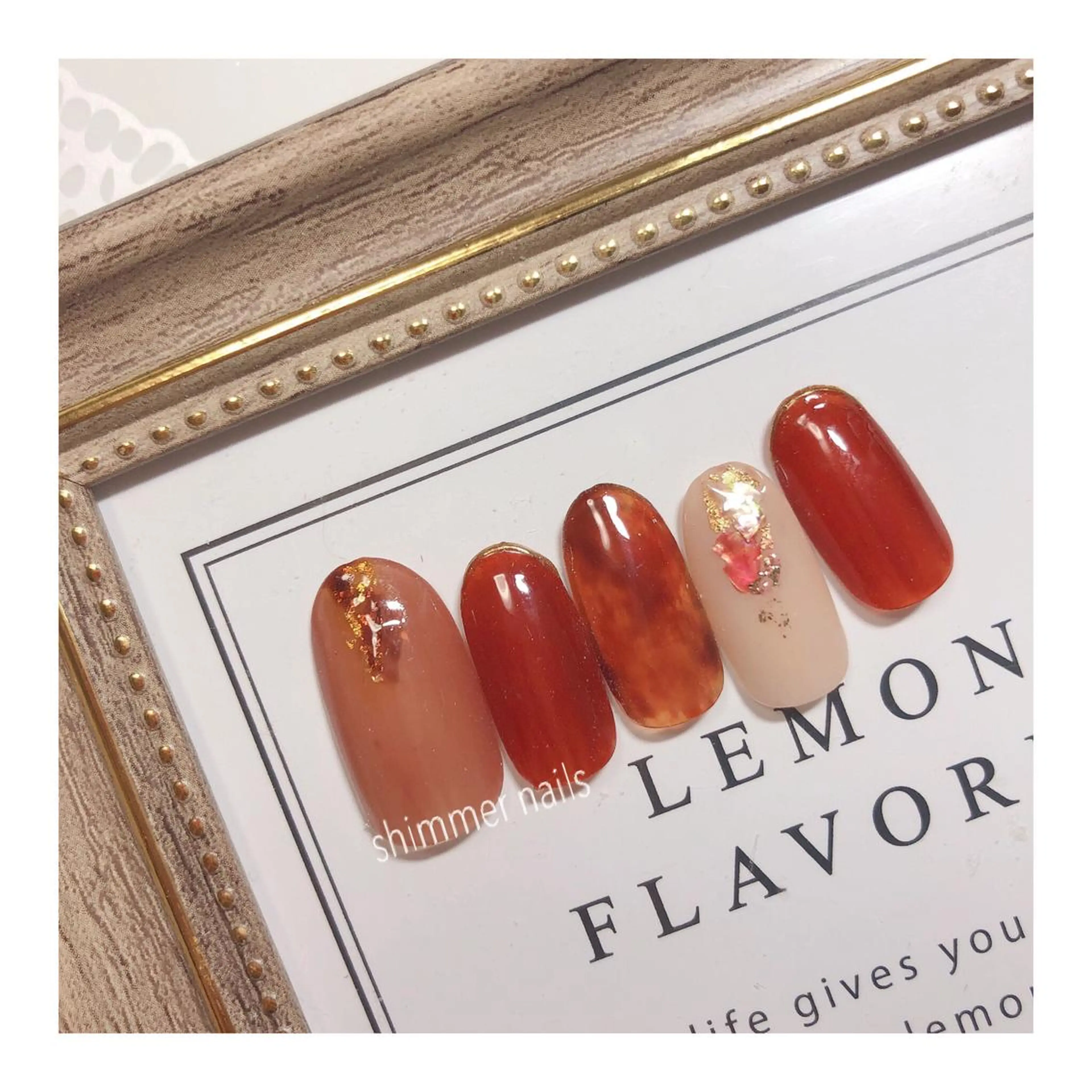 ネイル ブラウン オレンジ shimmer nailsのネイルデザイン