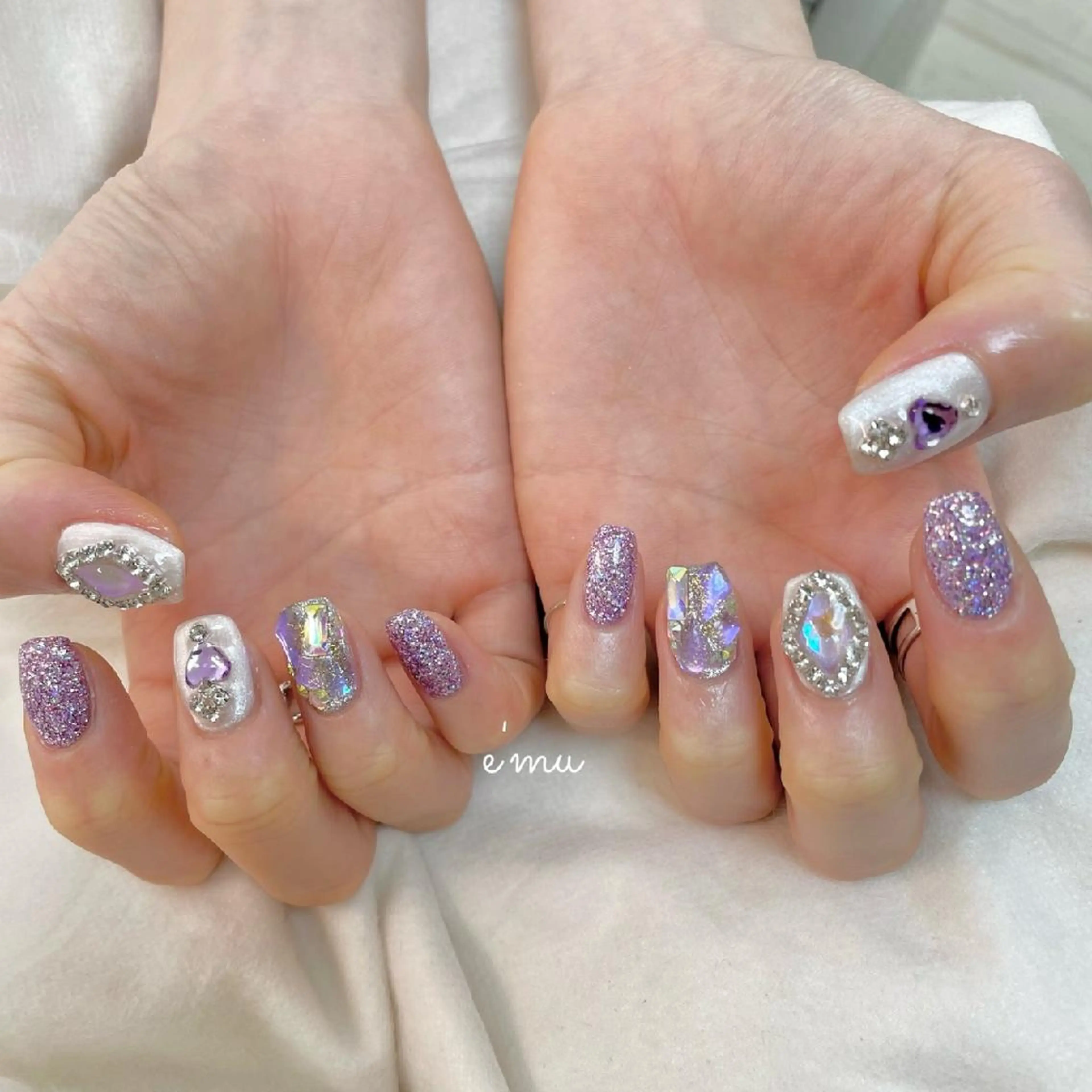ネイル キラキラネイル 韓国ネイル パープル nail salon e'mu💐のネイルデザイン