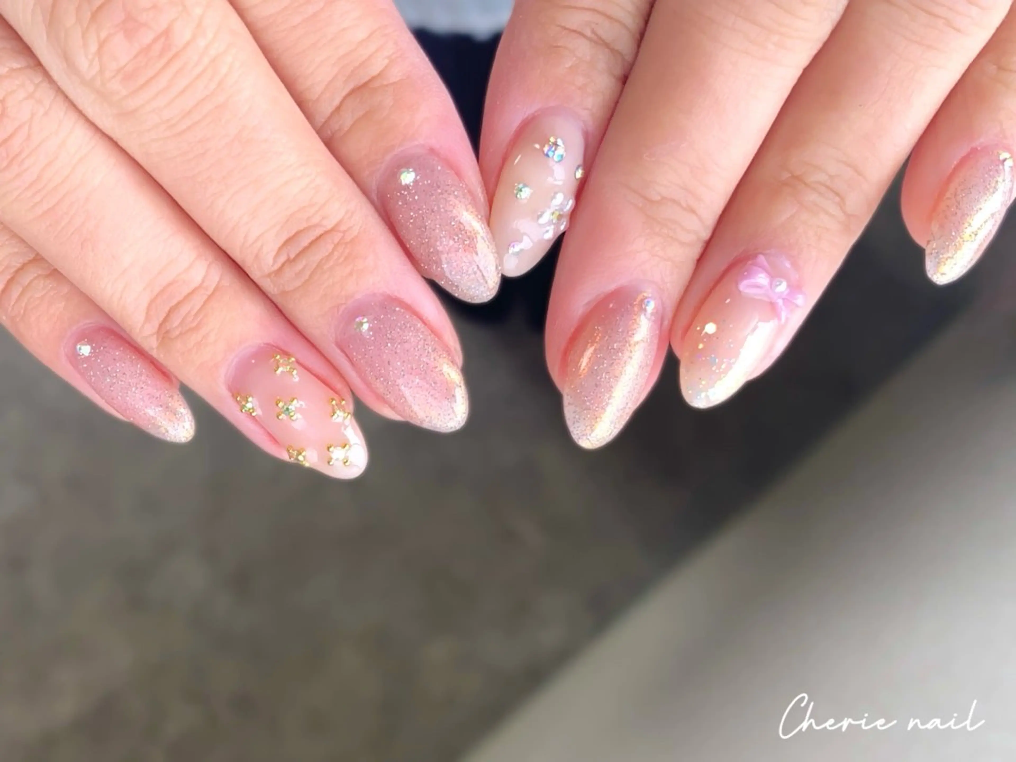 ネイル オーロラネイル フラッシュネイル ジェルネイル リボン ハンドネイル Cherienail yunaのネイルデザイン