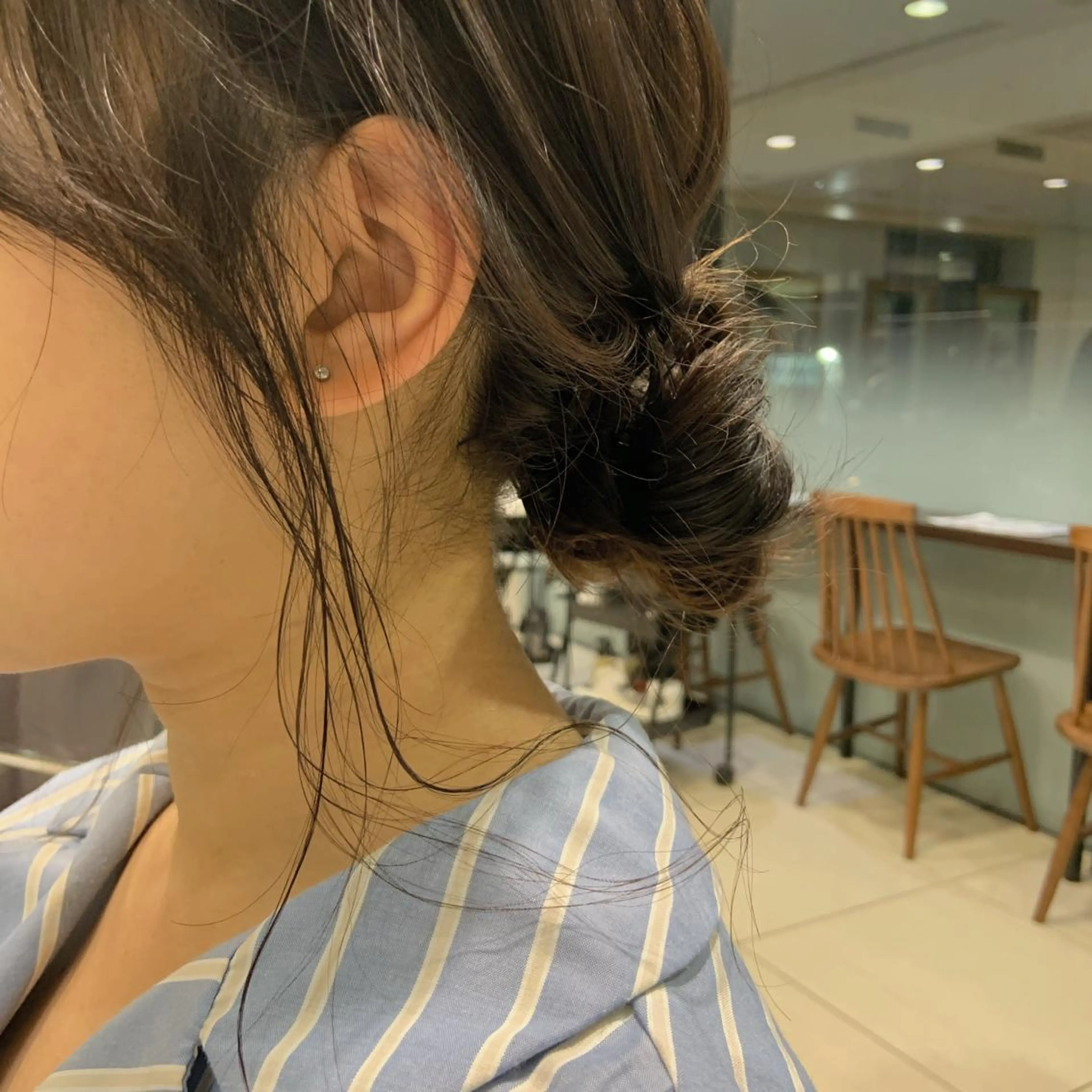 セミロング お団子ヘア タンバルモリパーマ 礒井メンキのヘアスタイル