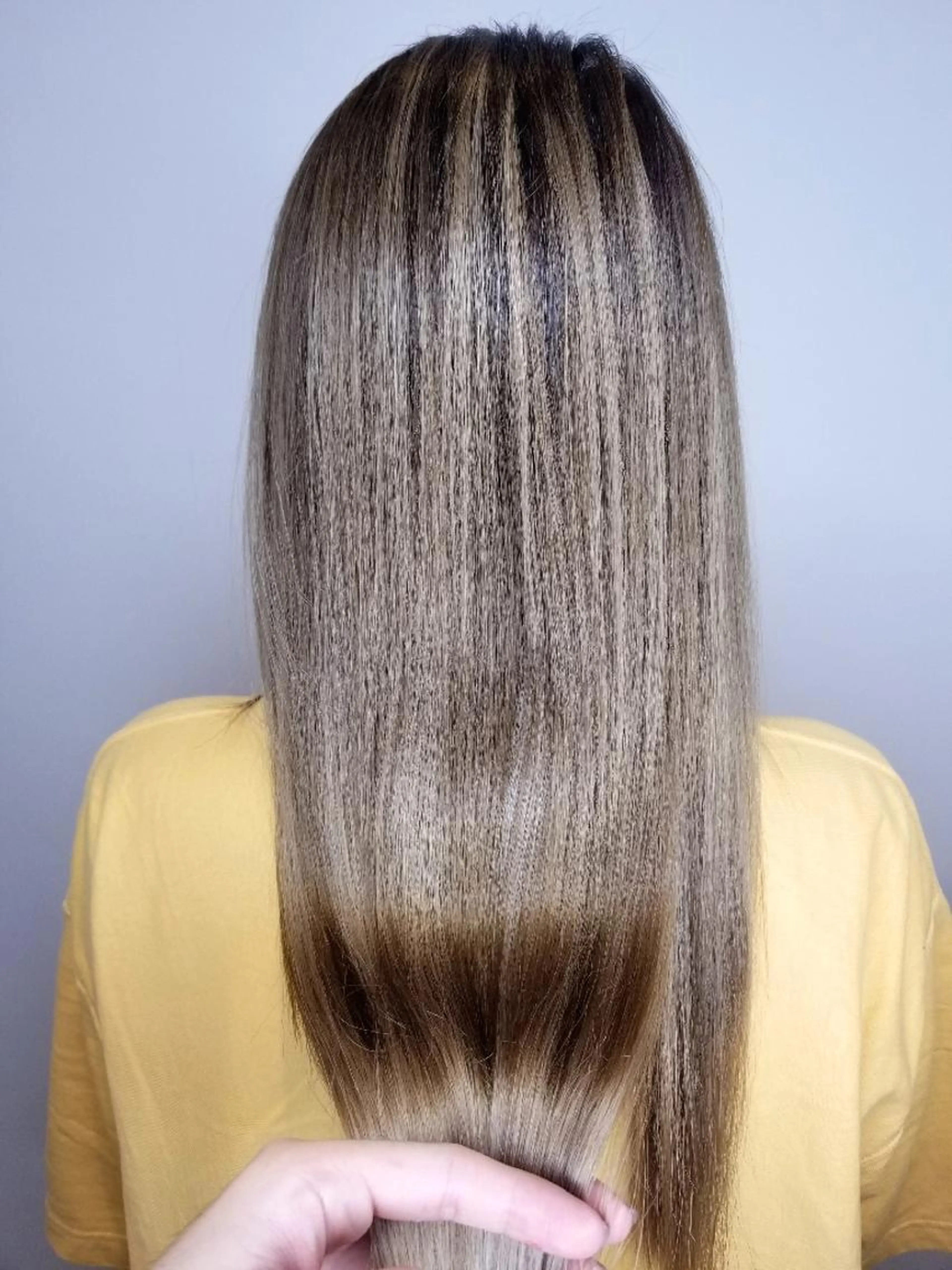 90%ダメージカット最高級髪質改善酸性縮毛矯正の写真