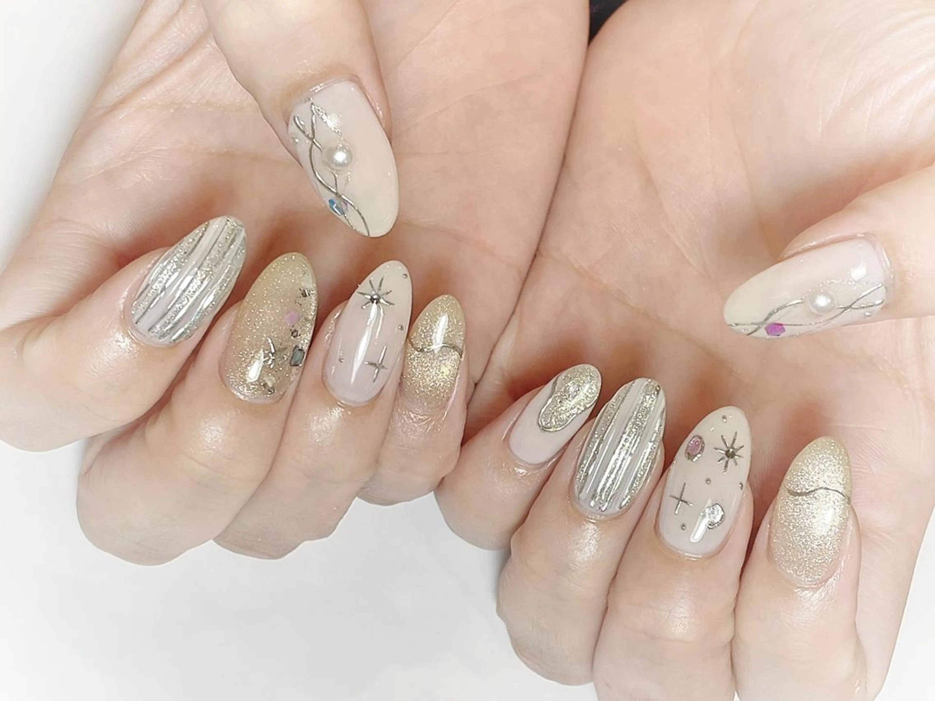 ネイル ストーンネイル ハンドネイル Cat's eye TOKYO 新宿店のネイルデザイン