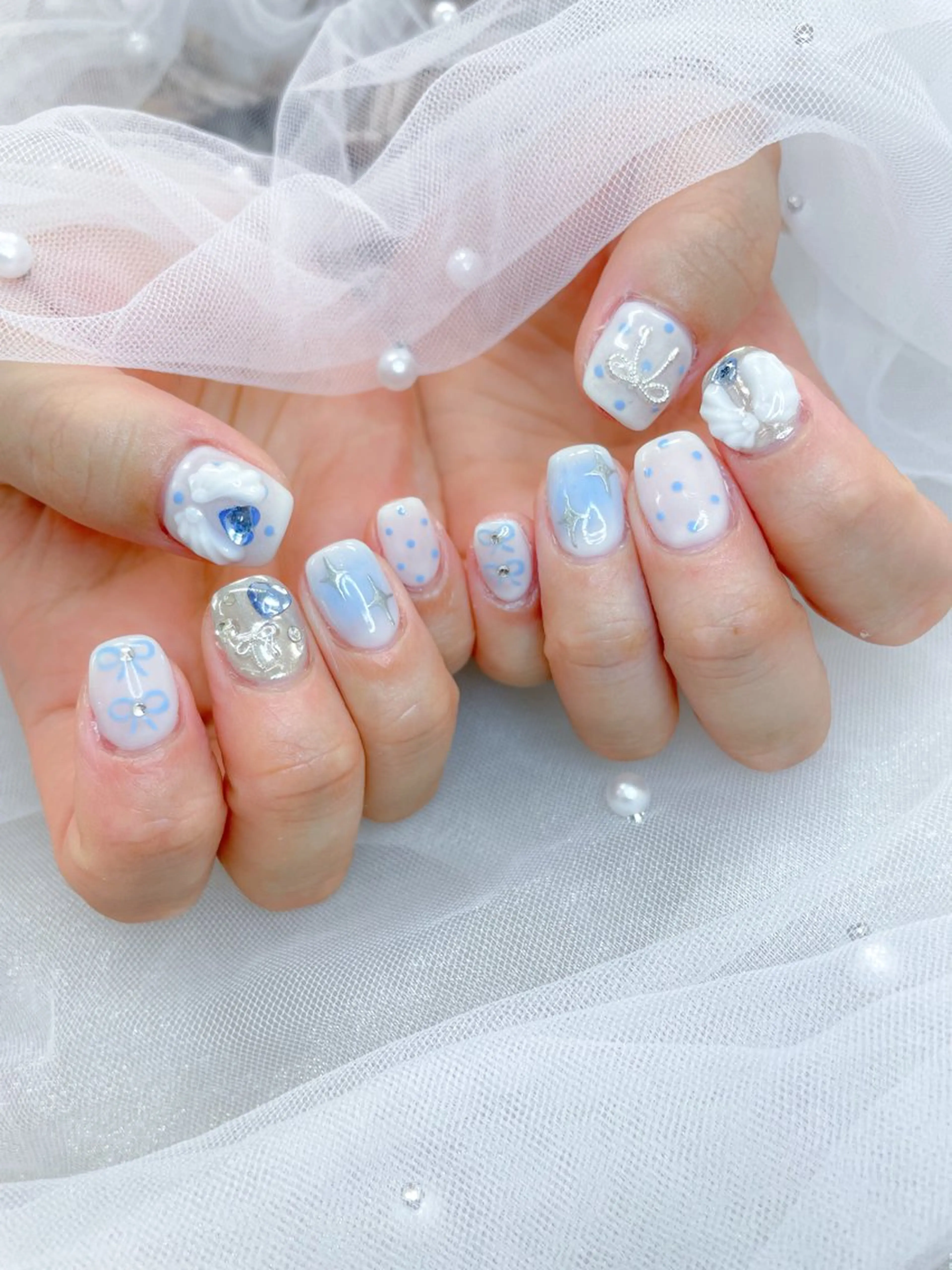 ネイル ジェルネイル リボン ハンドネイル 五十嵐 美智のネイルデザイン