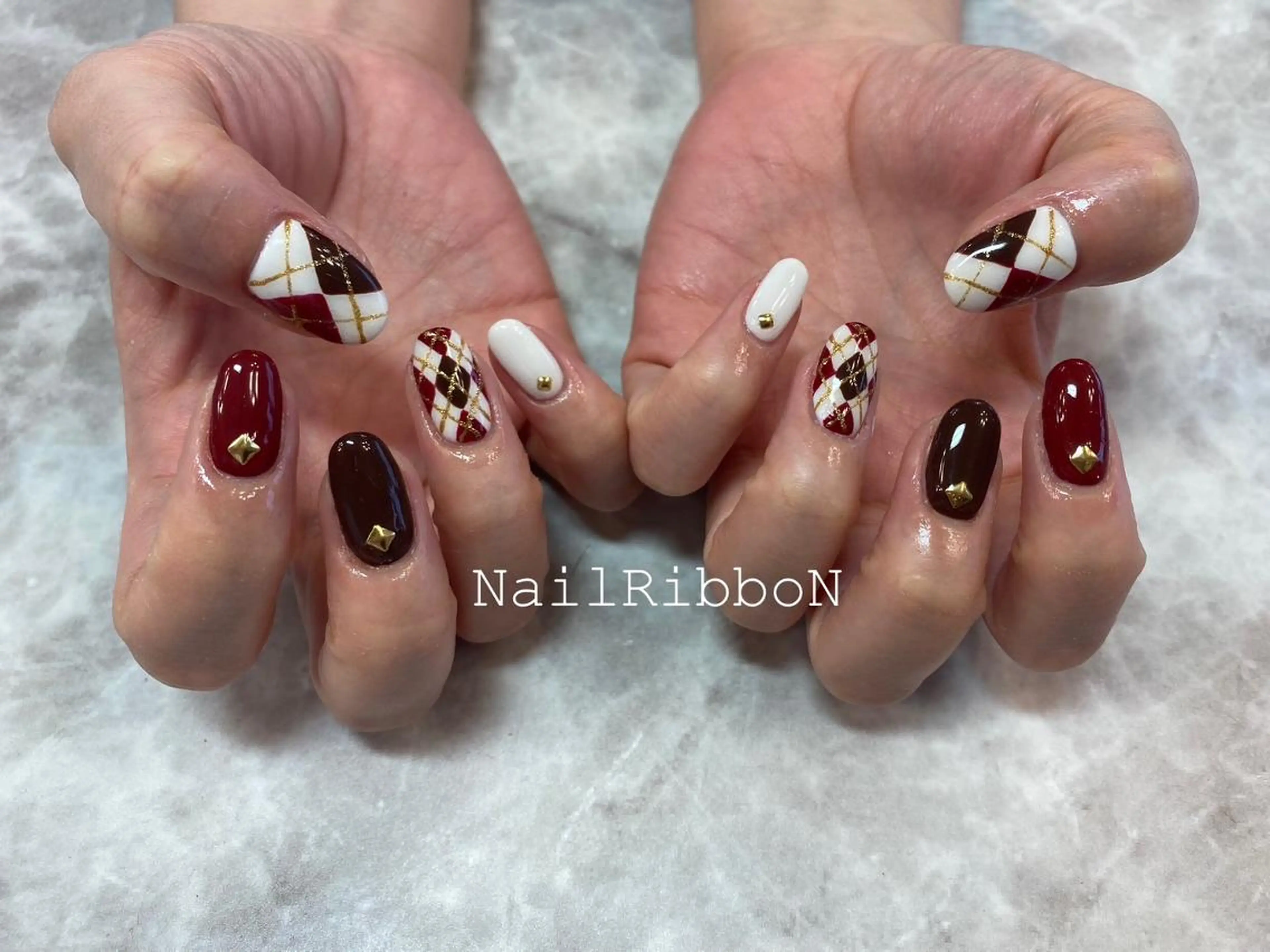 ネイル ネイルリボン 受付スタッフのネイルデザイン
