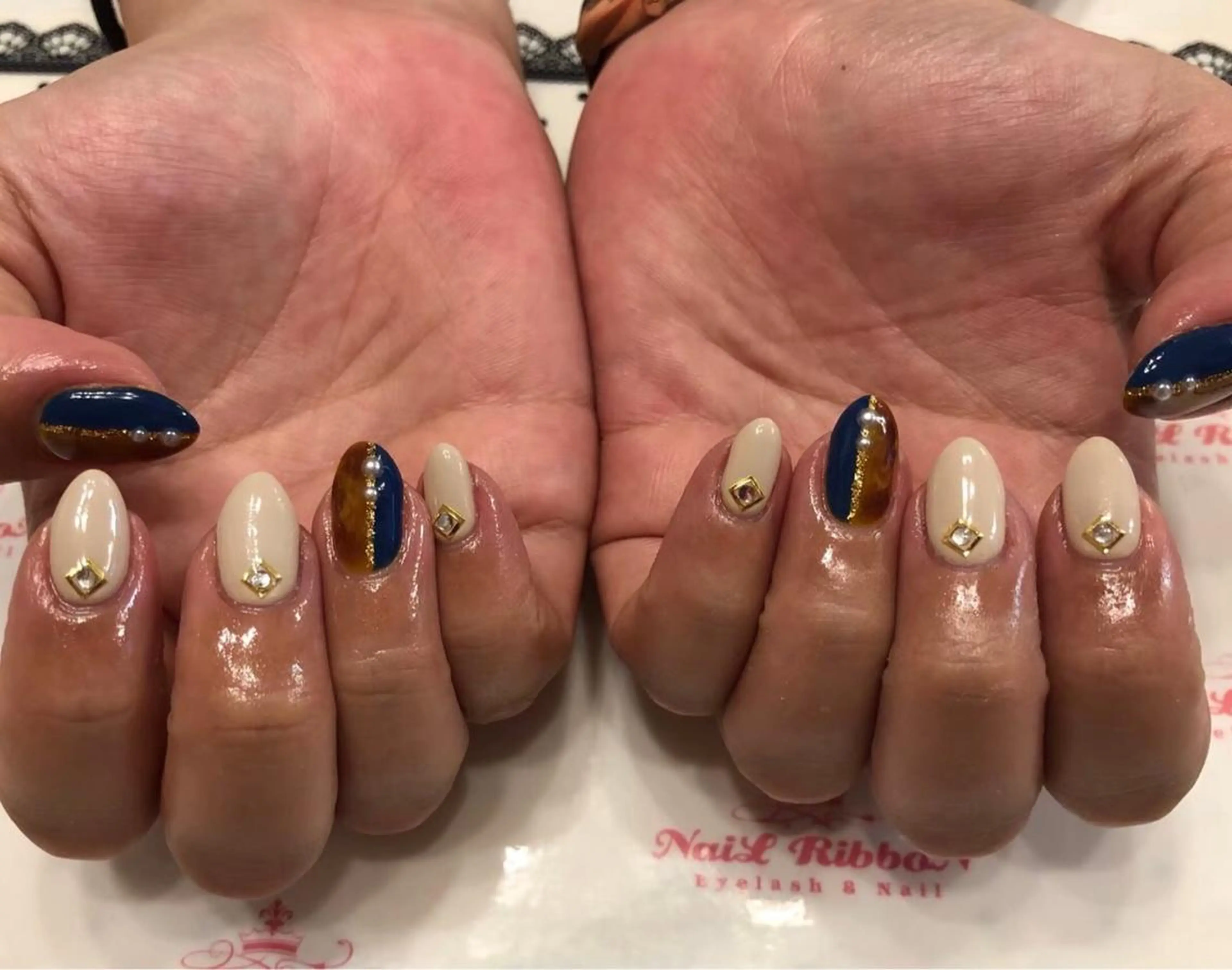 ネイル 春ネイル ネイルリボン 受付スタッフのネイルデザイン