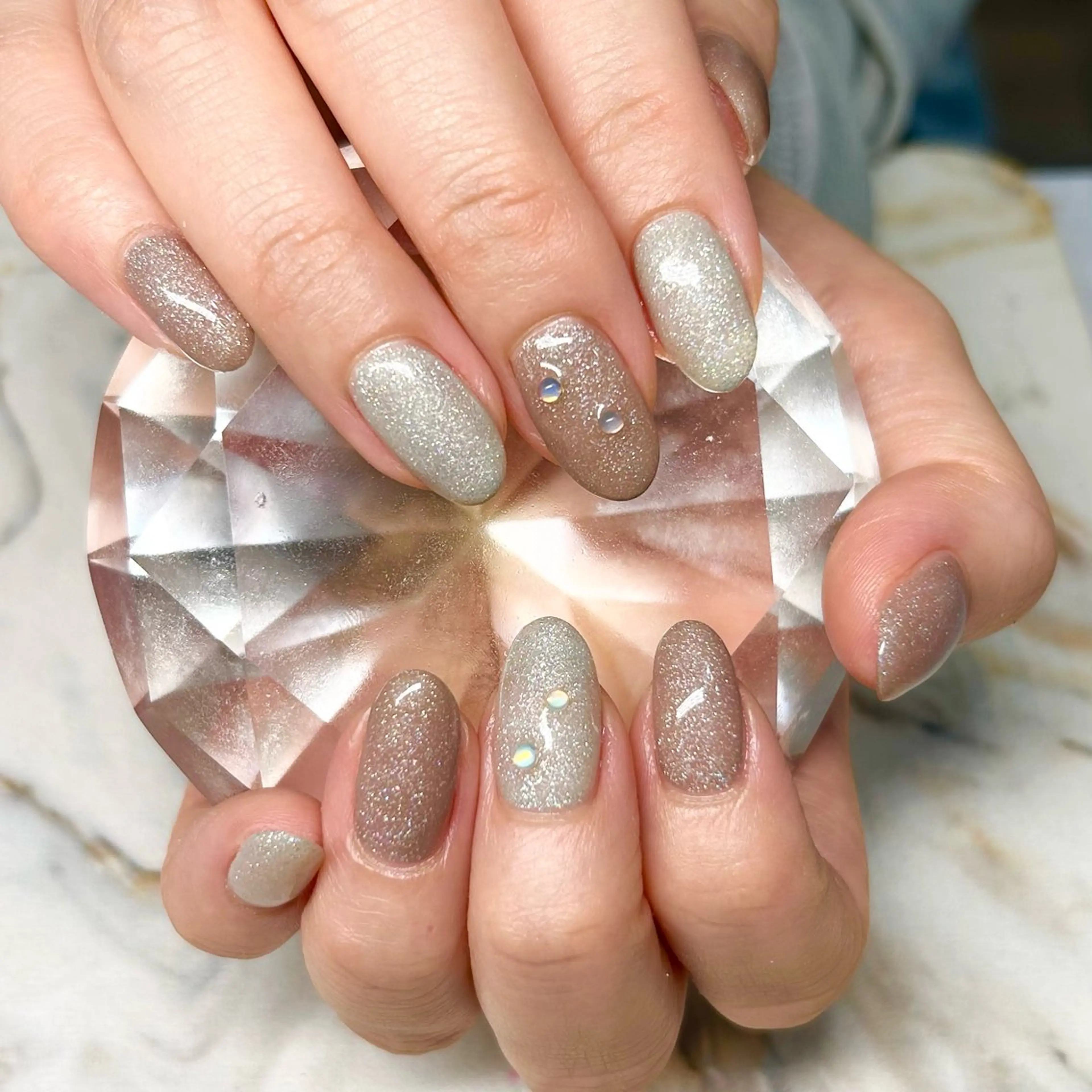 ネイル 氷ネイル・うるうるネイル キラキラネイル ラメ(グリッター) ニュアンスネイル オフィスネイル Nail Stellaのネイルデザイン