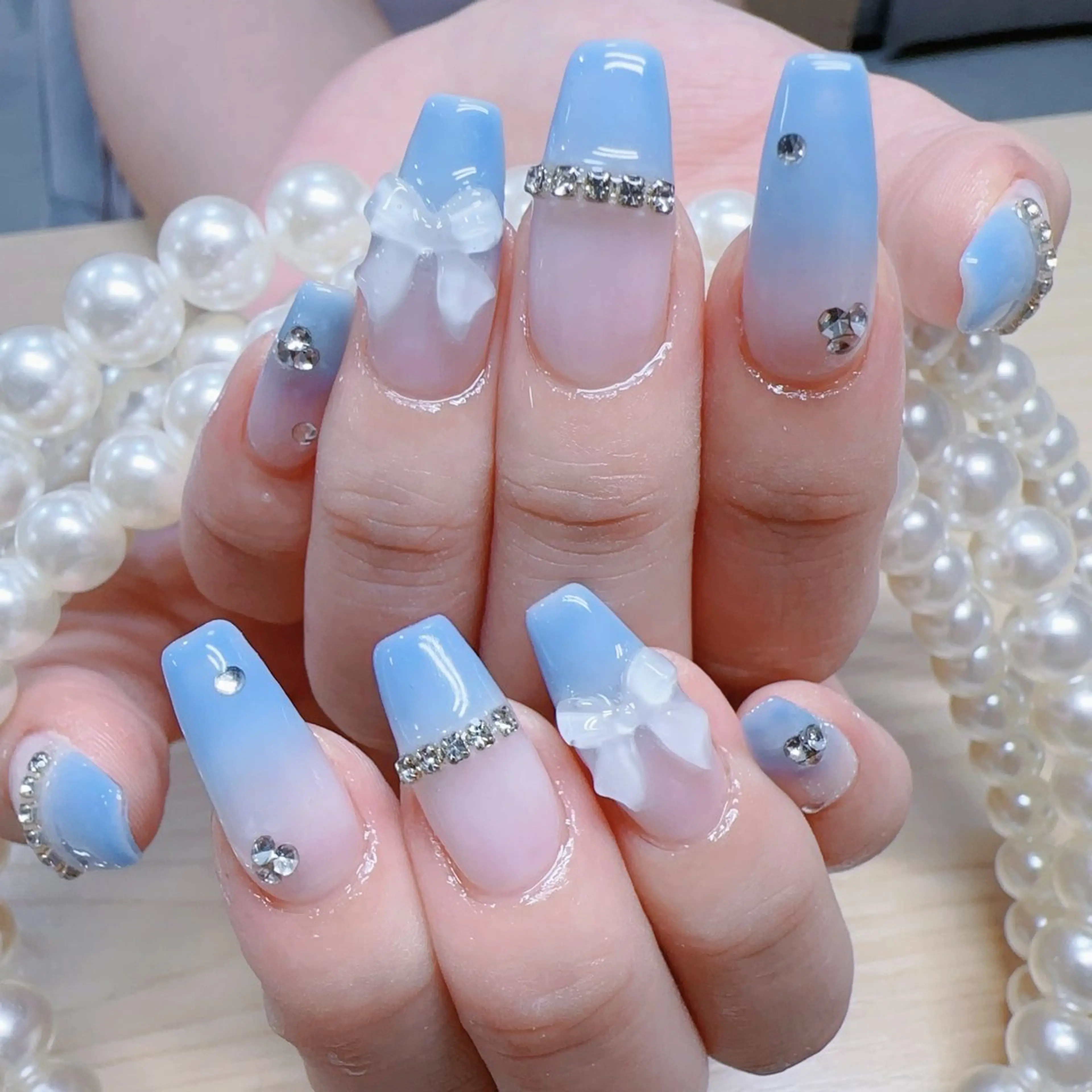 ネイル グラデーション リボン ハンドネイル MO MO🐻のネイルデザイン