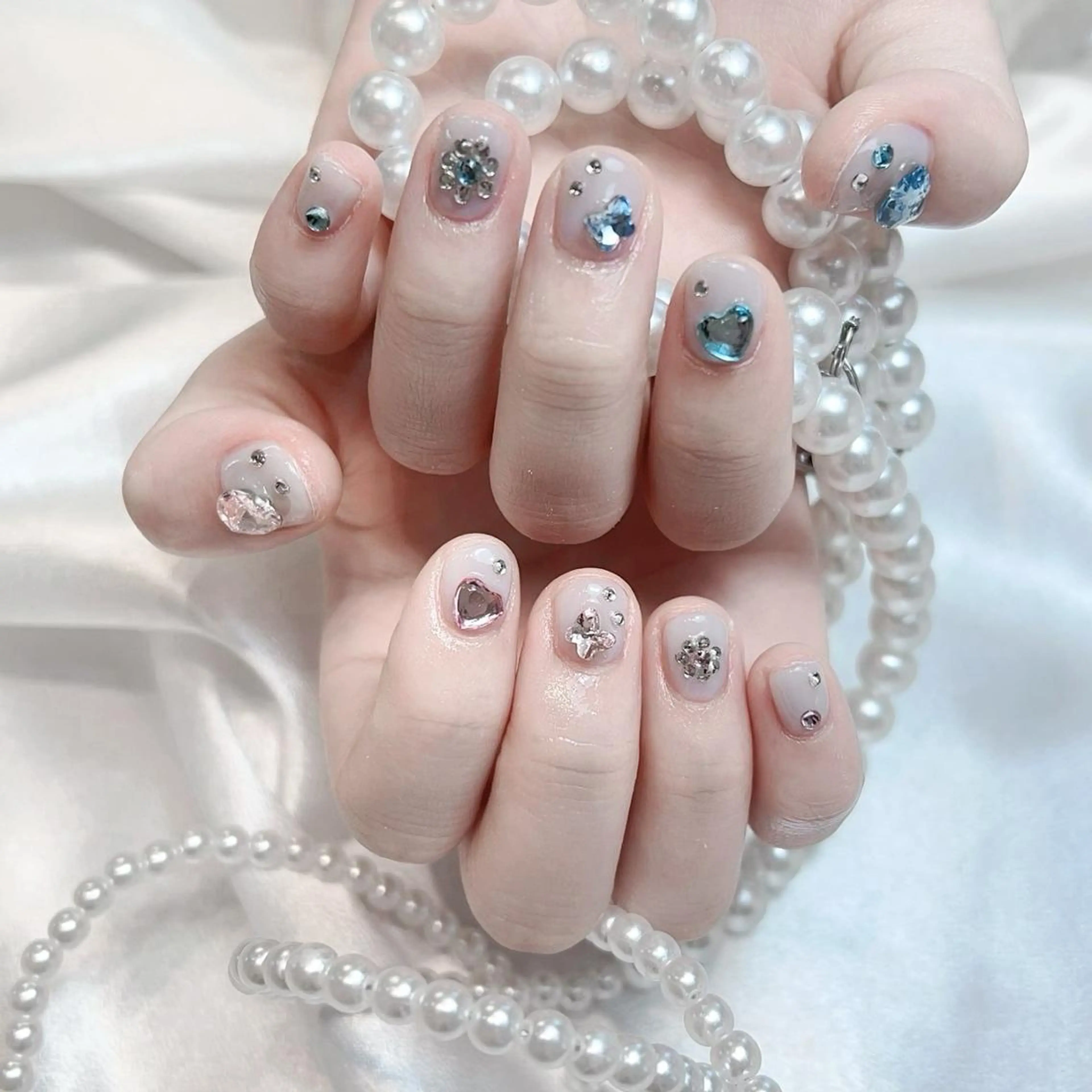 ネイル RAFFINE 月🦋🩵のネイルデザイン