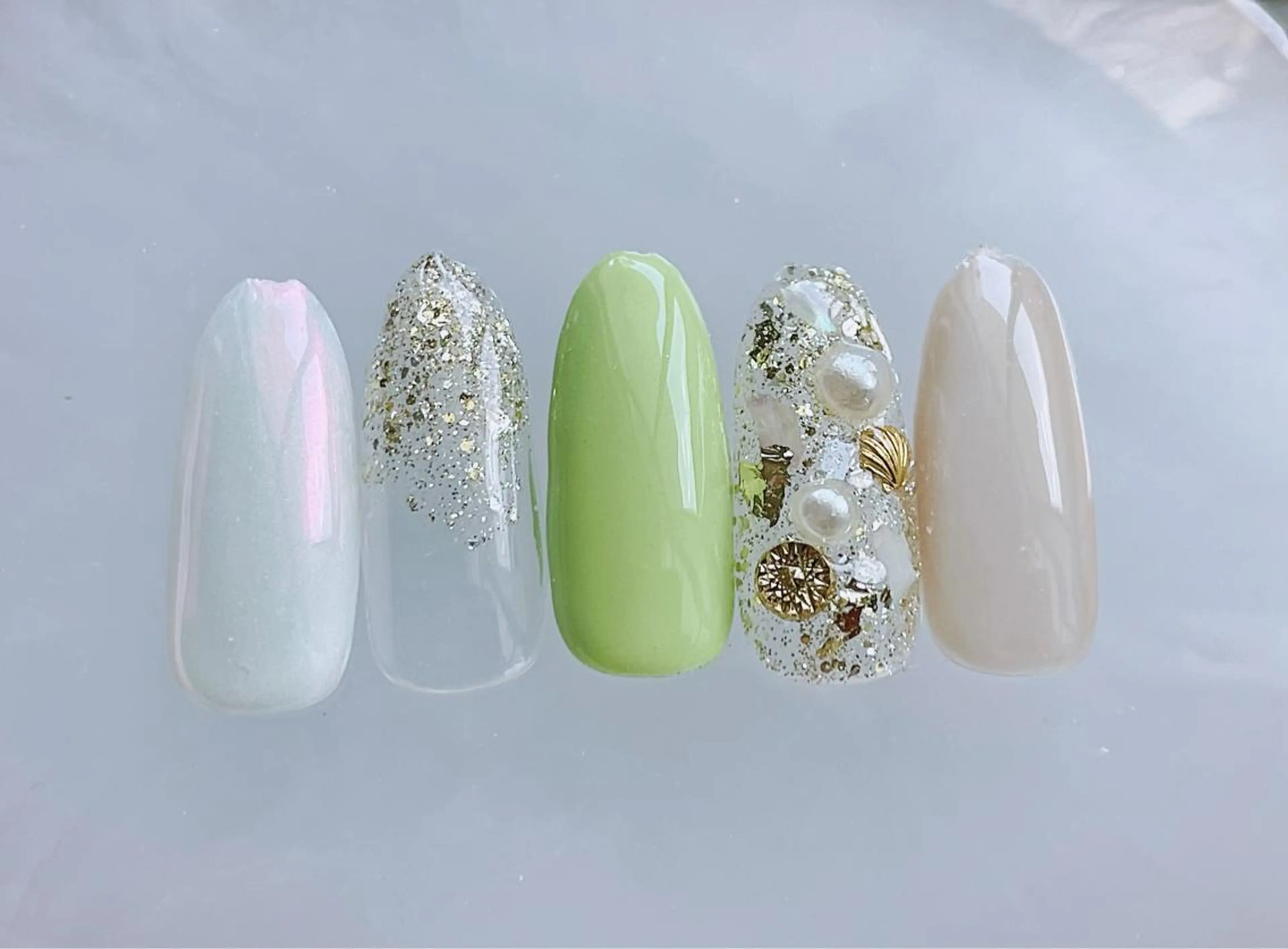 ネイル オーロラネイル ジェルネイル ゴージャス キラキラネイル パラジェル ハンドネイル Satomi  のネイルデザイン
