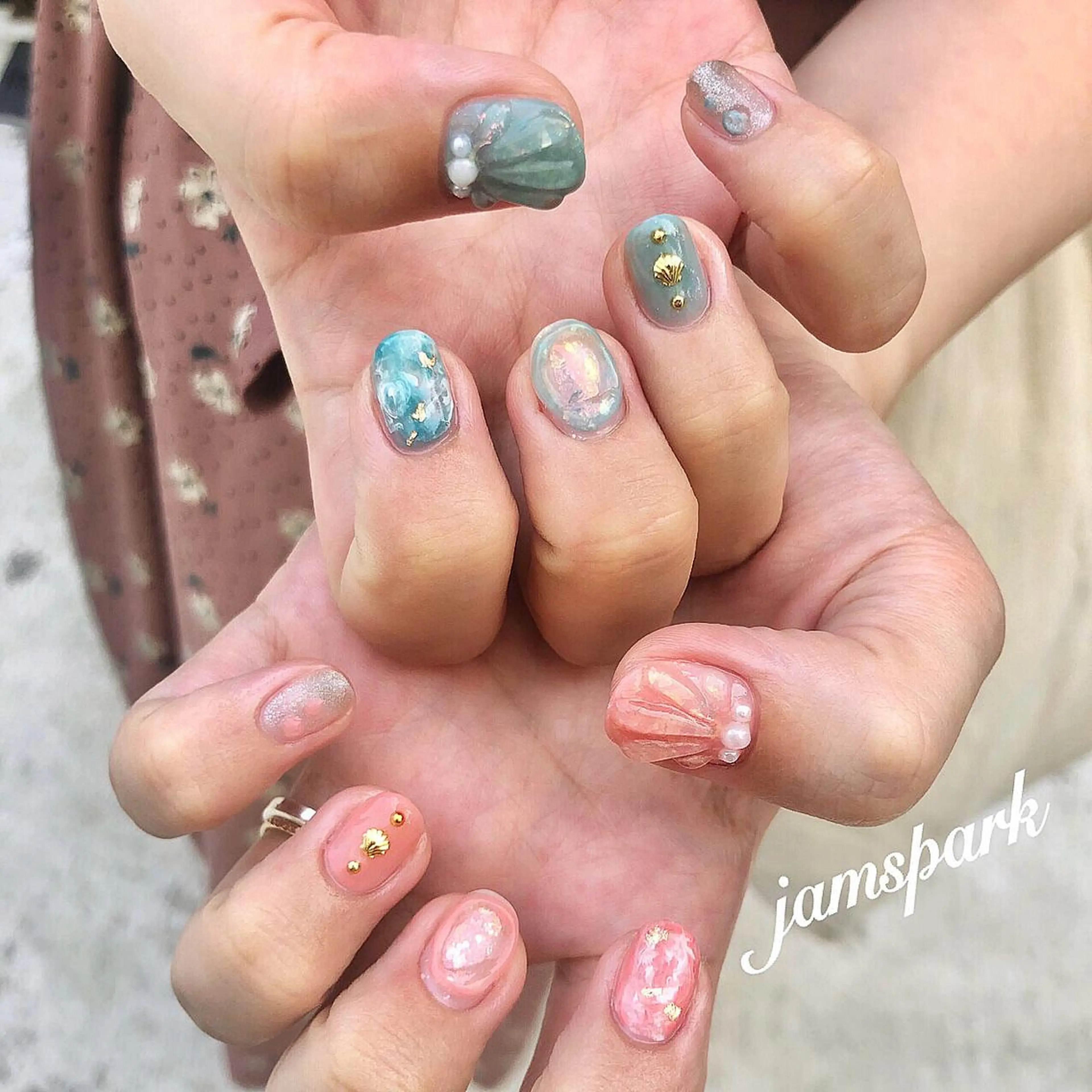 ネイル オーロラネイル ジェルネイル 水色 ニュアンスネイル オレンジ ハンドネイル jamspark ✨のネイルデザイン