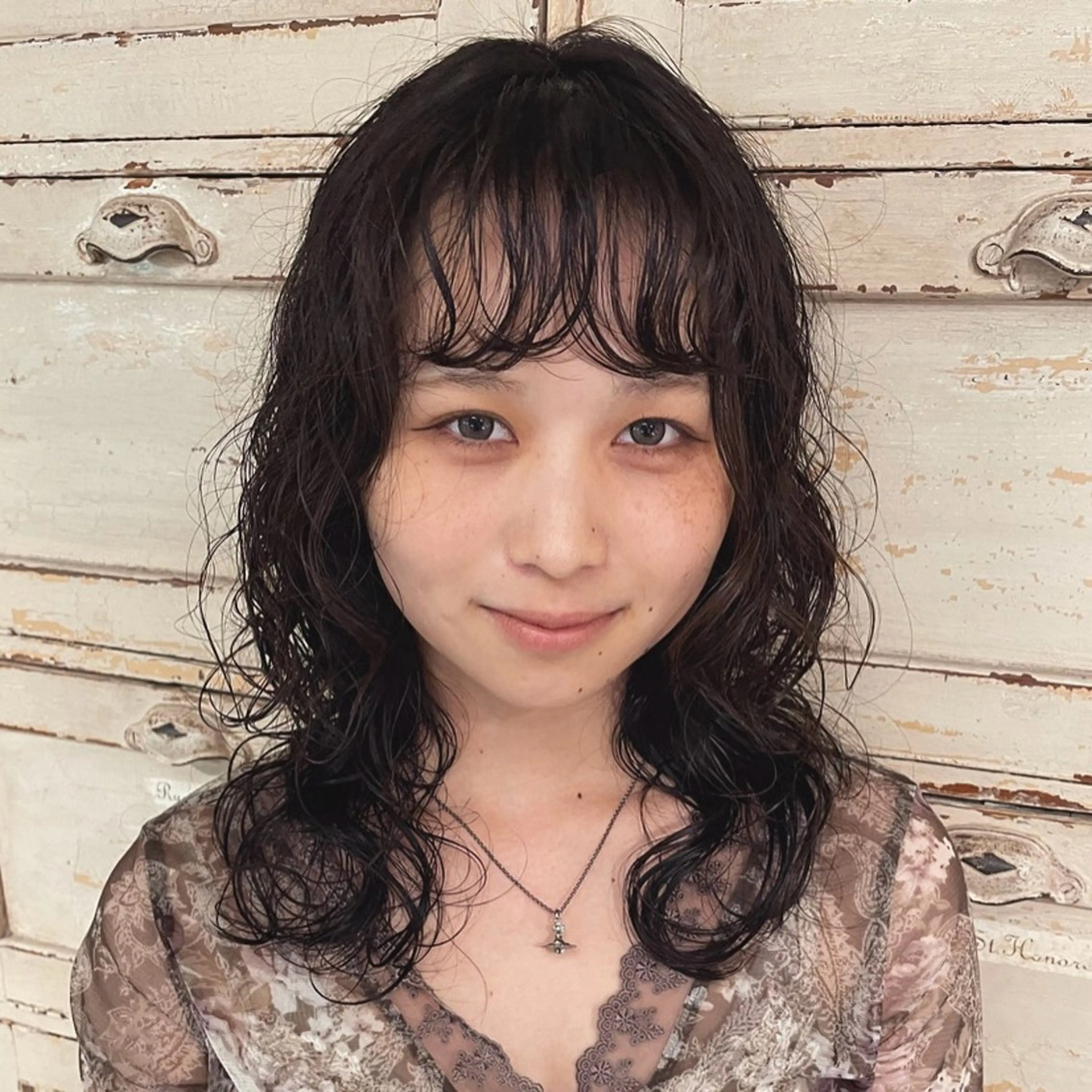 セミロング パーマ RorriM natsuのヘアスタイル