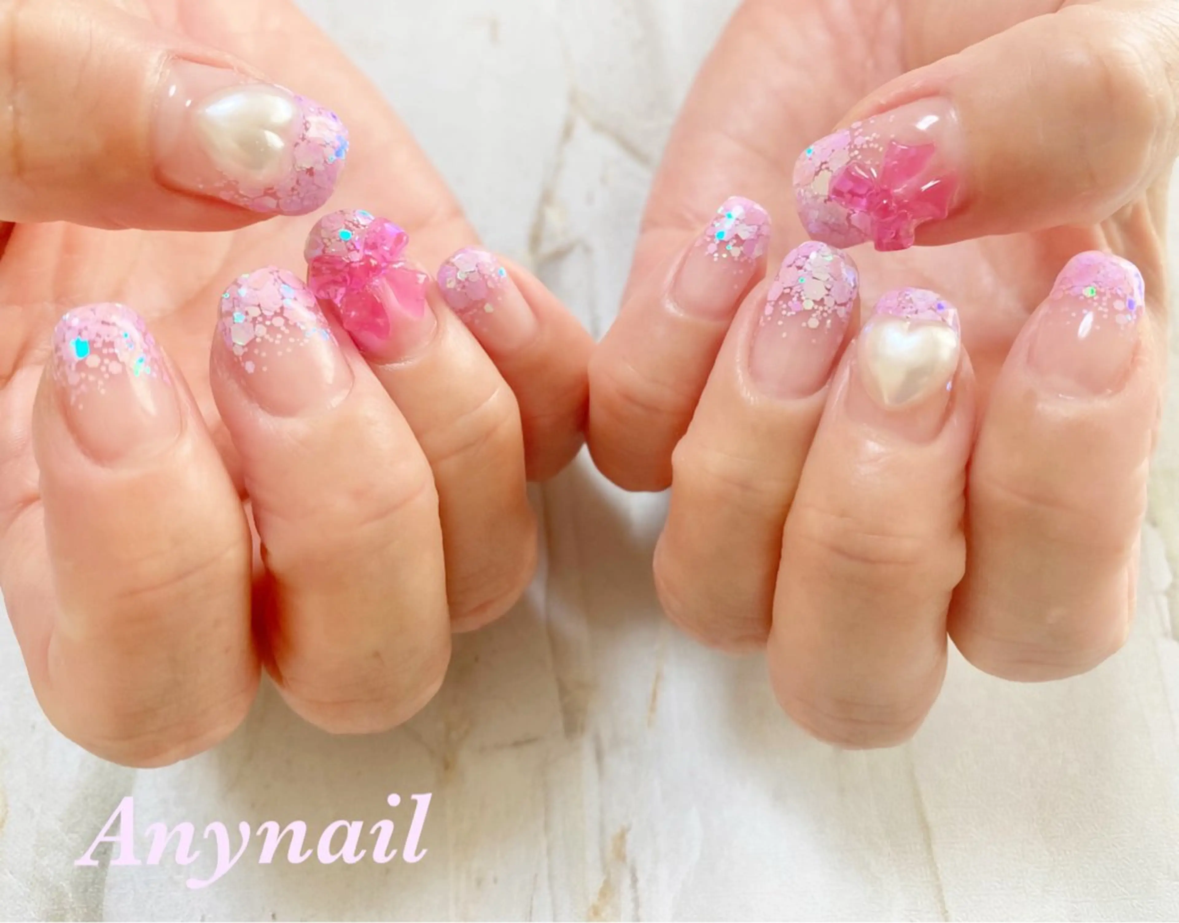 ネイル ブルー グラデーション ハート ホログラムネイル リボン 岩澤 恵子のネイルデザイン