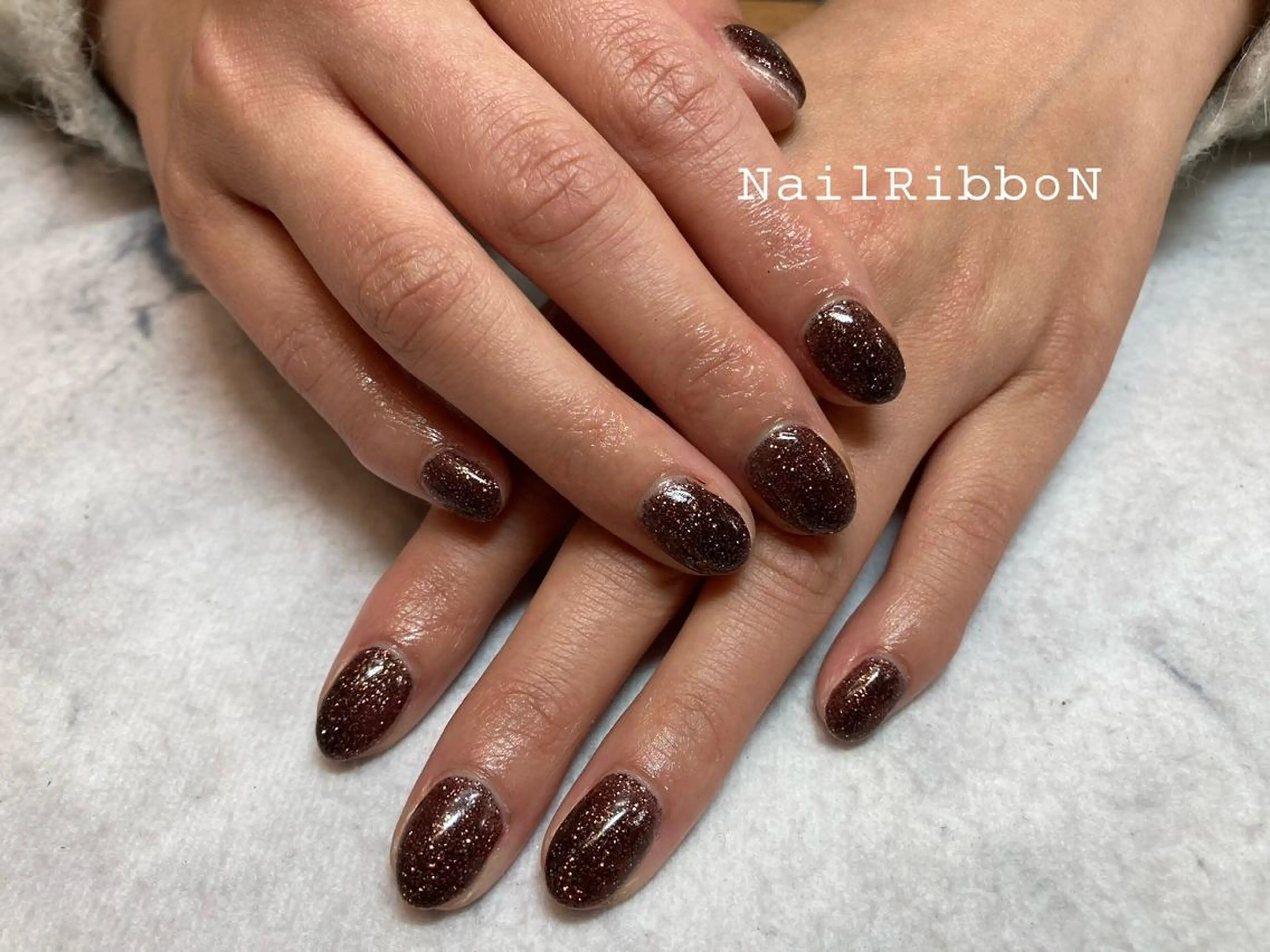 ネイル ネイルリボン 受付スタッフのネイルデザイン