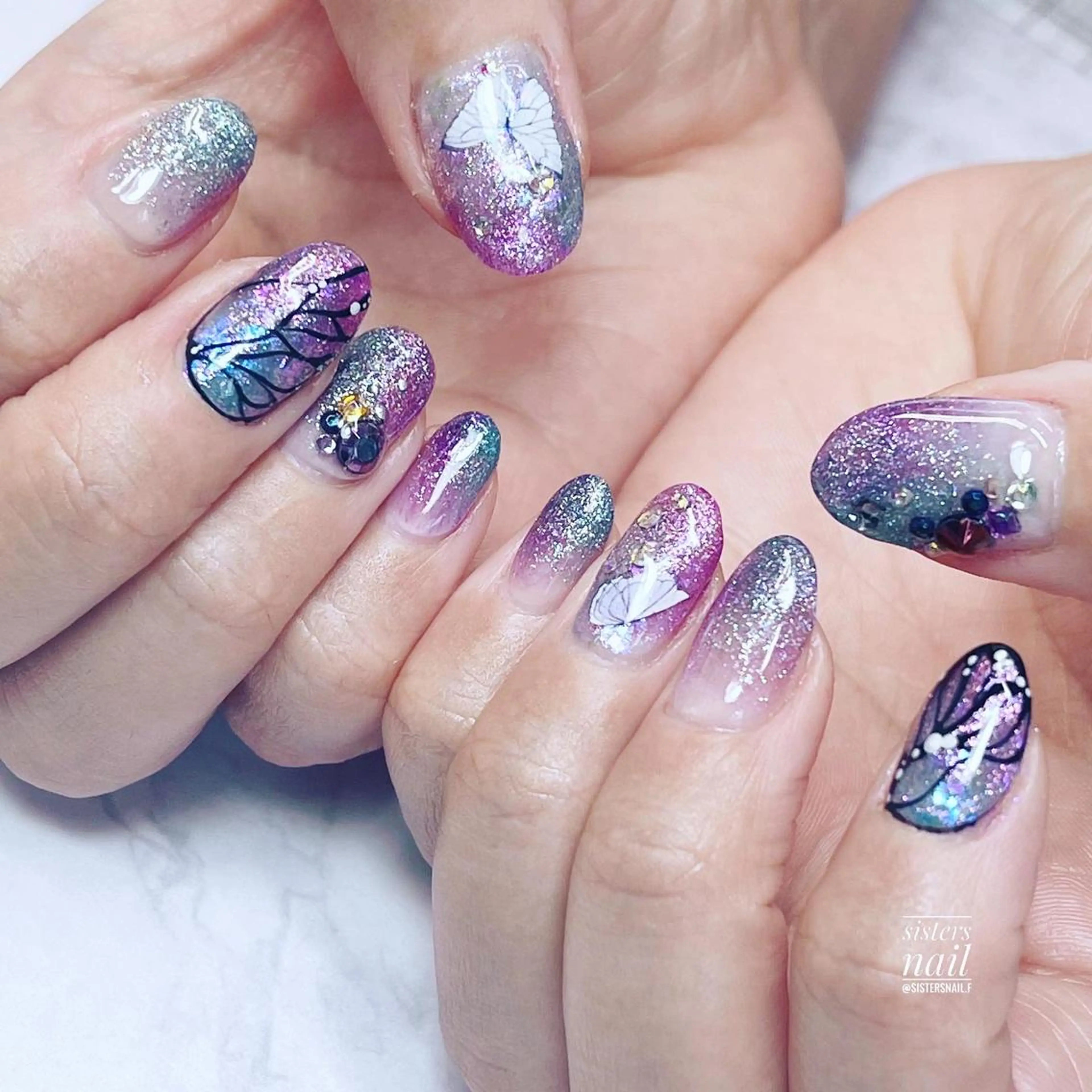 ネイル アートネイル ブルー グラデーション キラキラネイル ラメ(グリッター) sisters nail.fのネイルデザイン