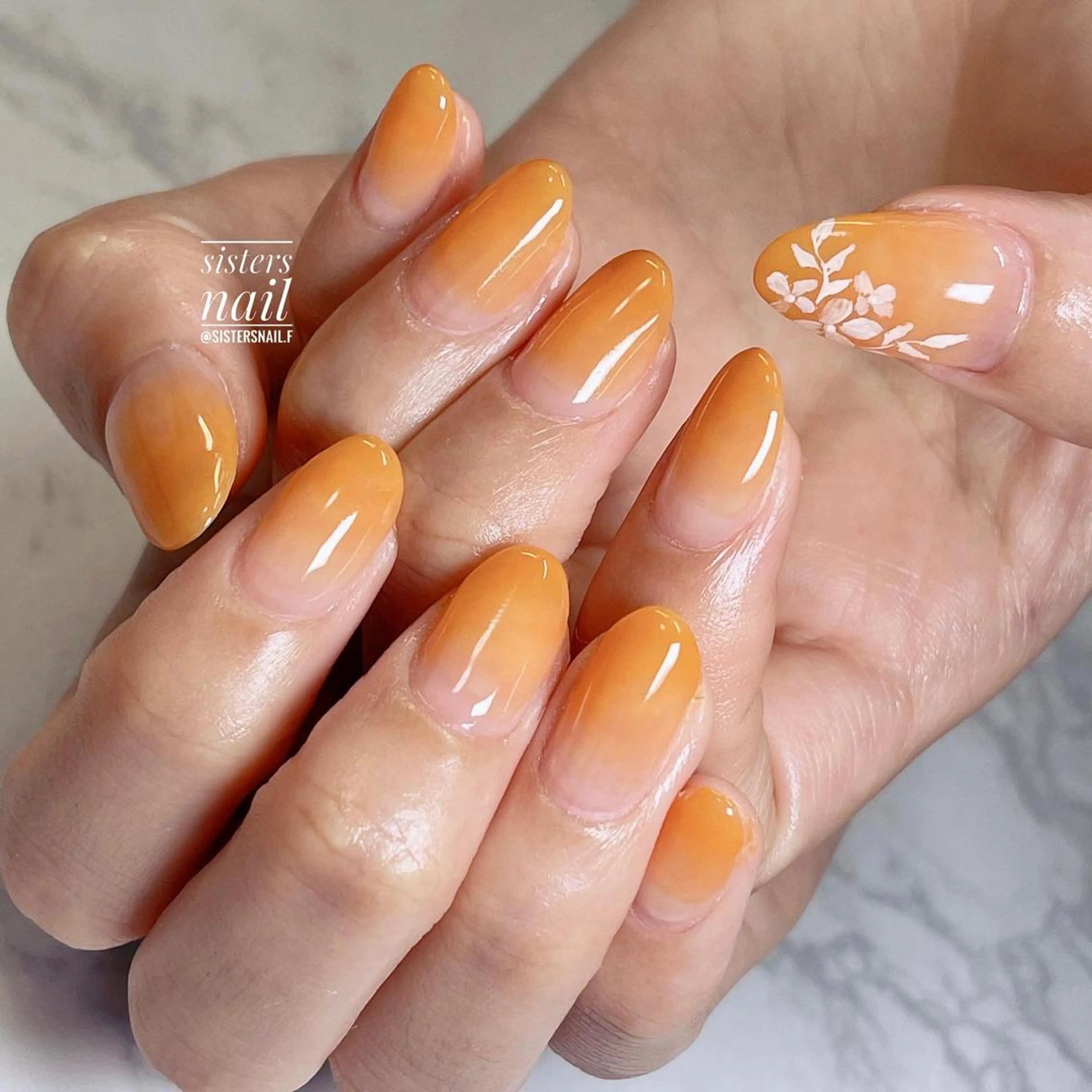 ネイル アートネイル フラワーネイル グラデーション オレンジ 夏ネイル sisters nail.fのネイルデザイン