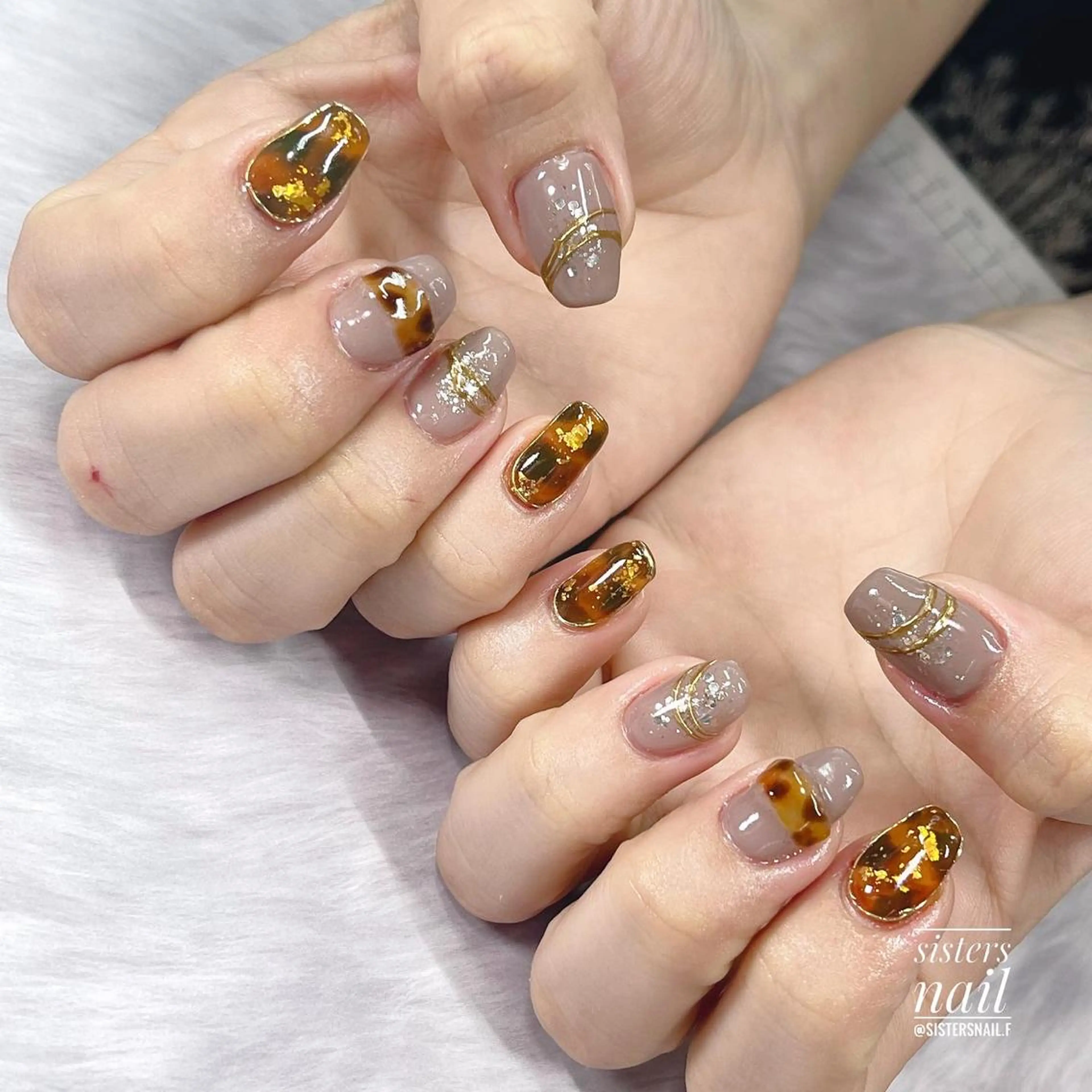 ネイル アートネイル べっ甲ネイル ブラウン キラキラネイル ミラーネイル sisters nail.fのネイルデザイン