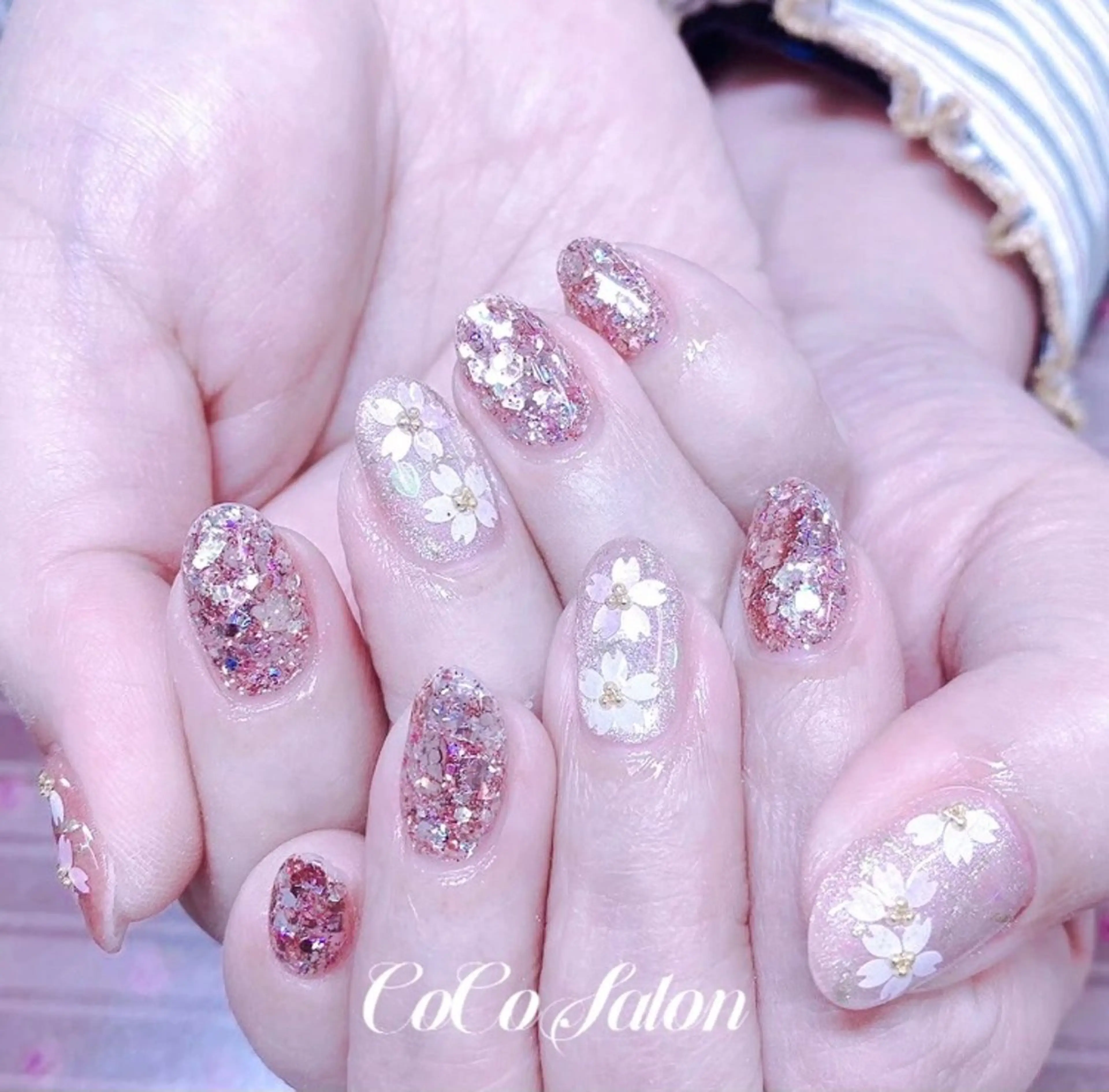 ネイル 桜ネイル フラワーネイル ジェルネイル キラキラネイル 春ネイル CoCo Salon ネイル/睫毛/脱毛のネイルデザイン