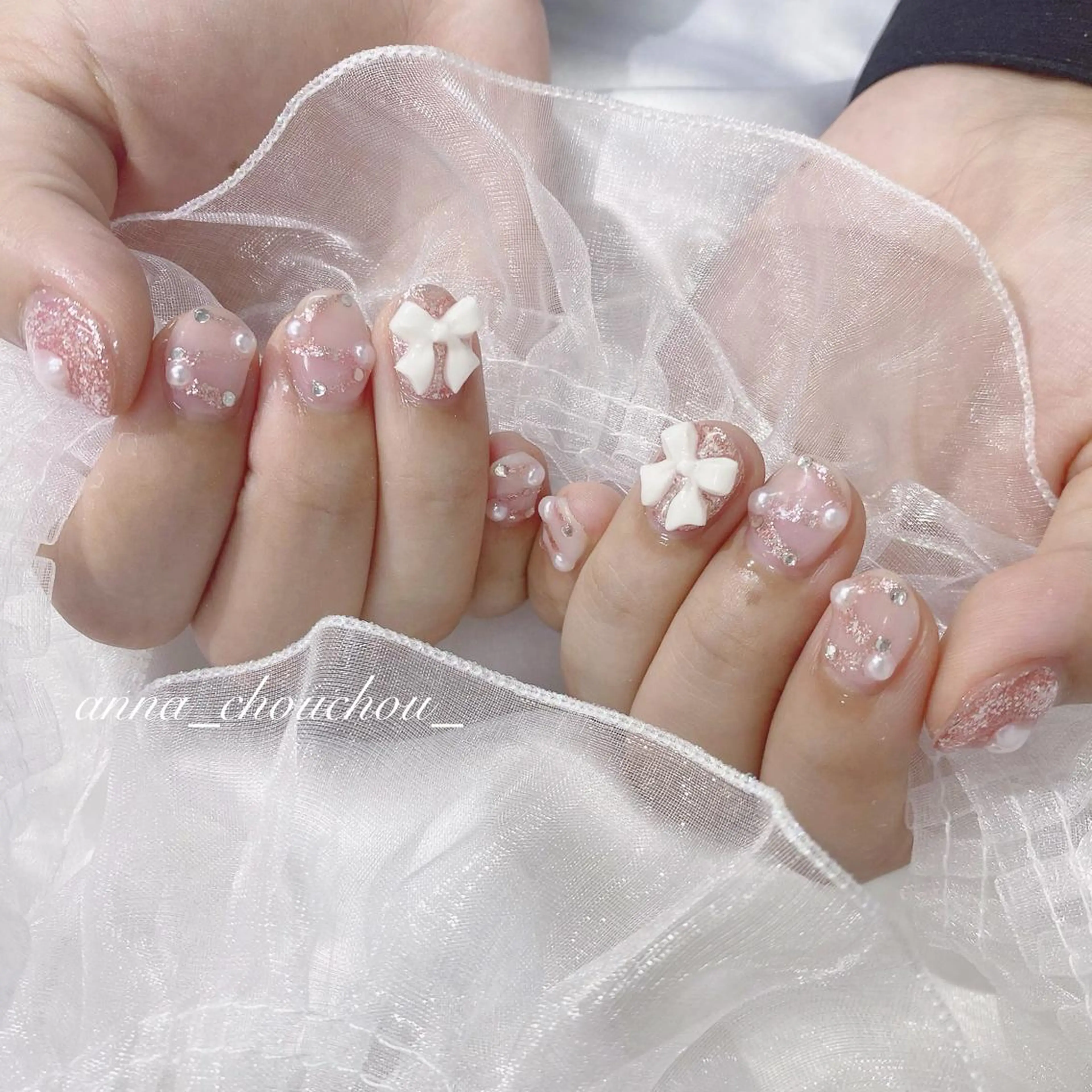 ネイル キラキラネイル リボン Anna Sano⭐️のネイルデザイン