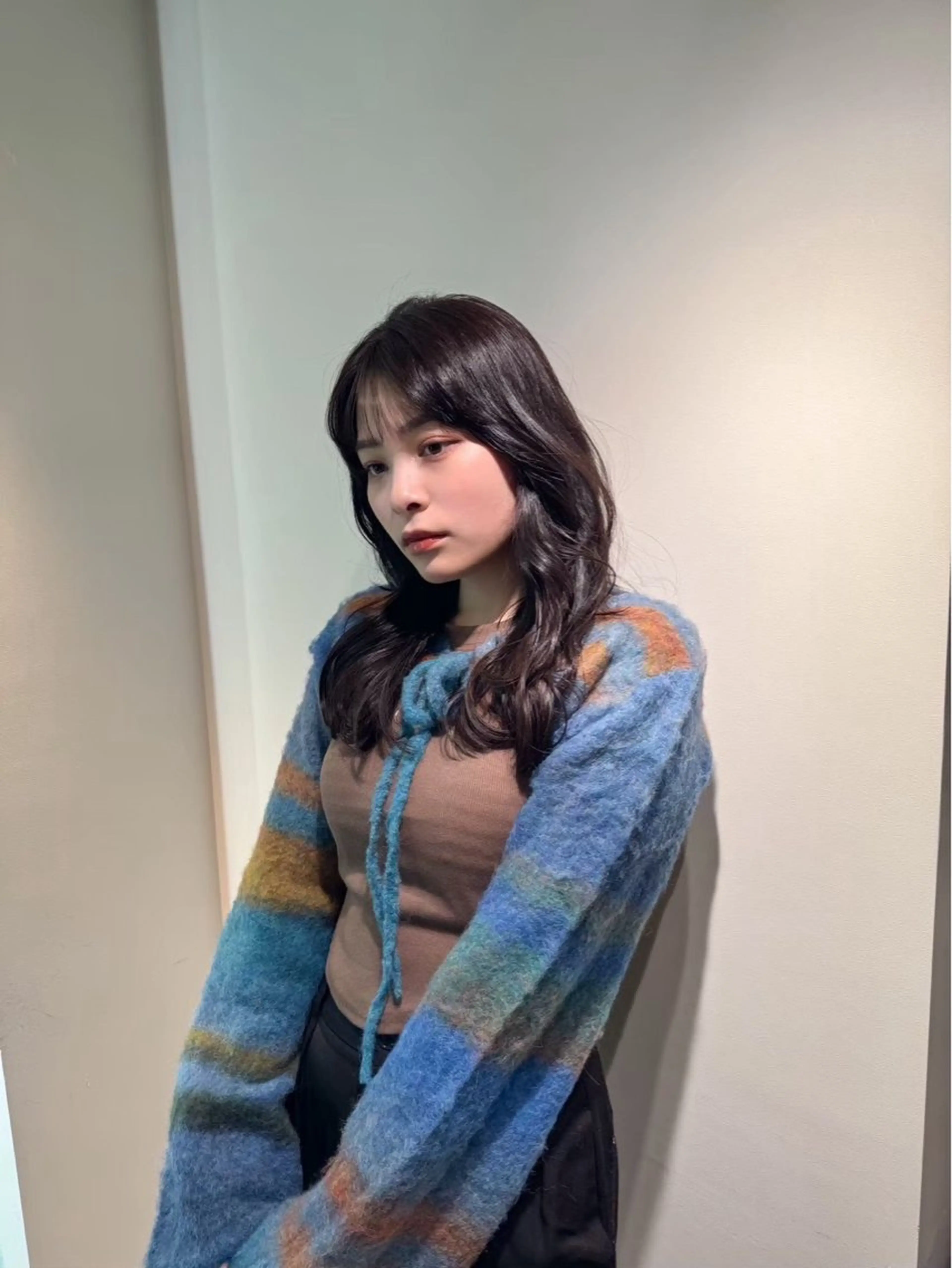 顔周りカット × 巻き仕上げの写真