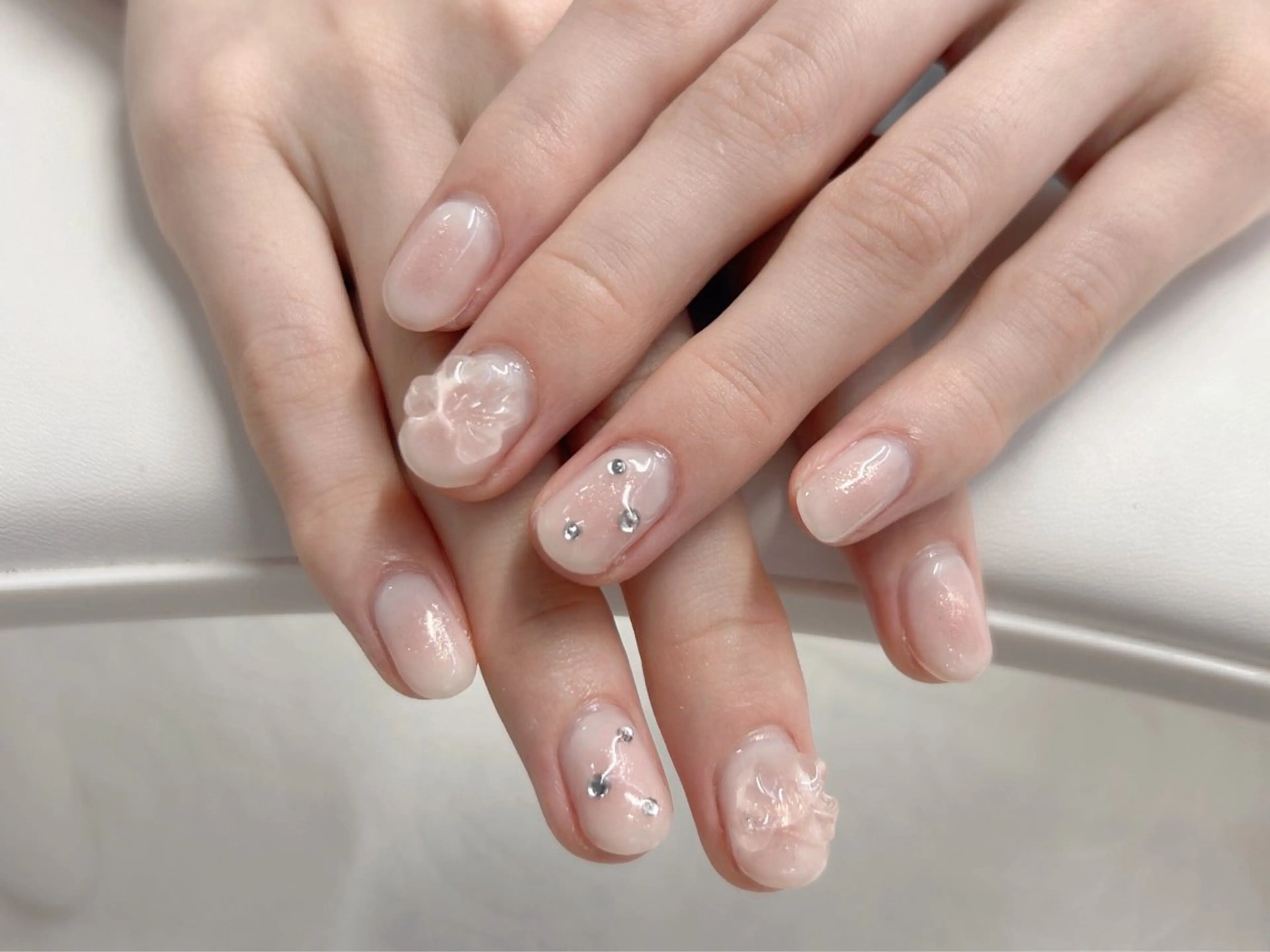 ネイル チークネイル 桜ネイル ガーリー リボン ワンホンネイル ハンドネイル Forca total studio所属・Forca Airaのネイルデザイン