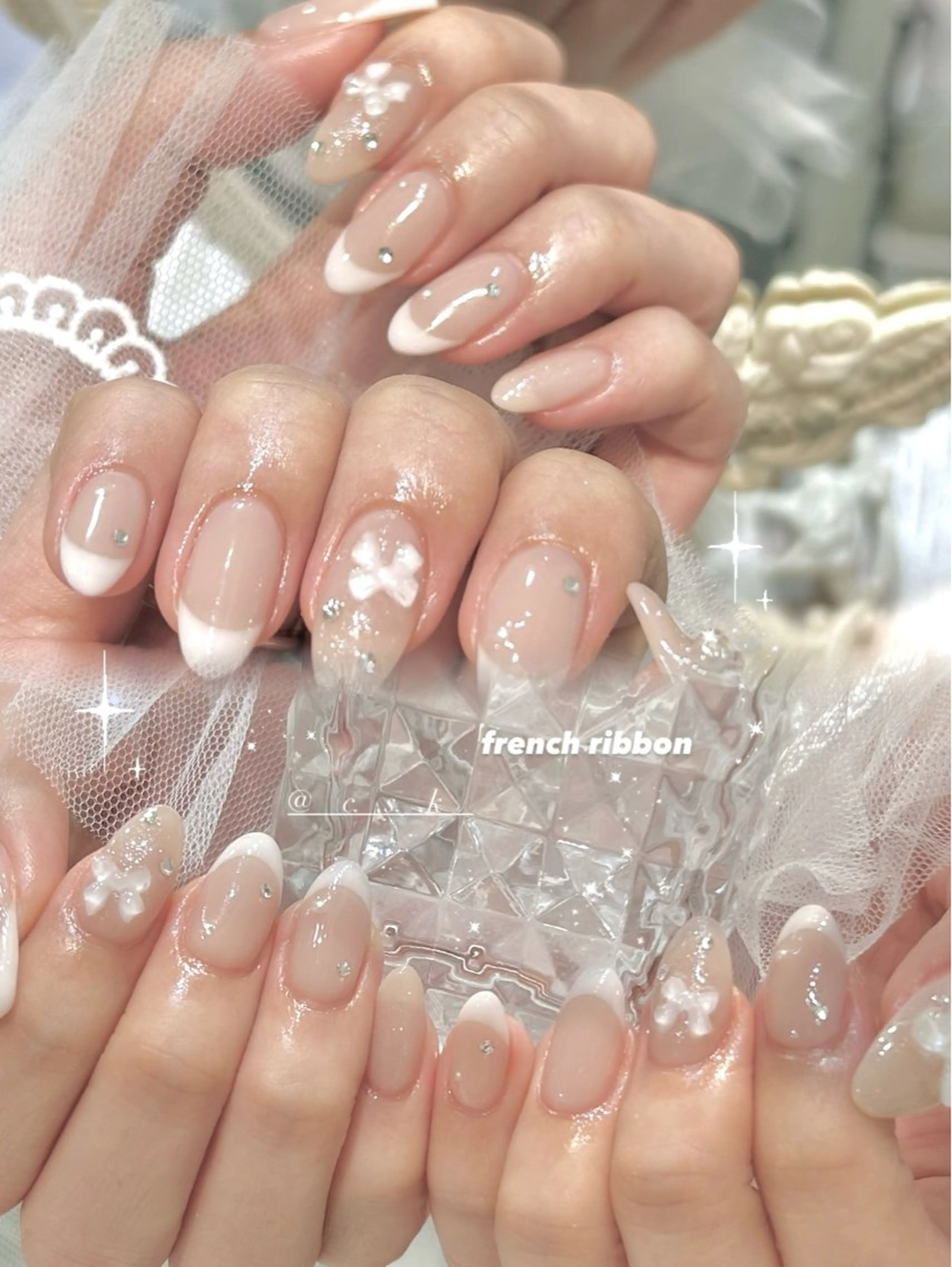 ネイル リボン ハンドネイル 🎀チーク/ちゅるん 🫧chisa🎀のネイルデザイン