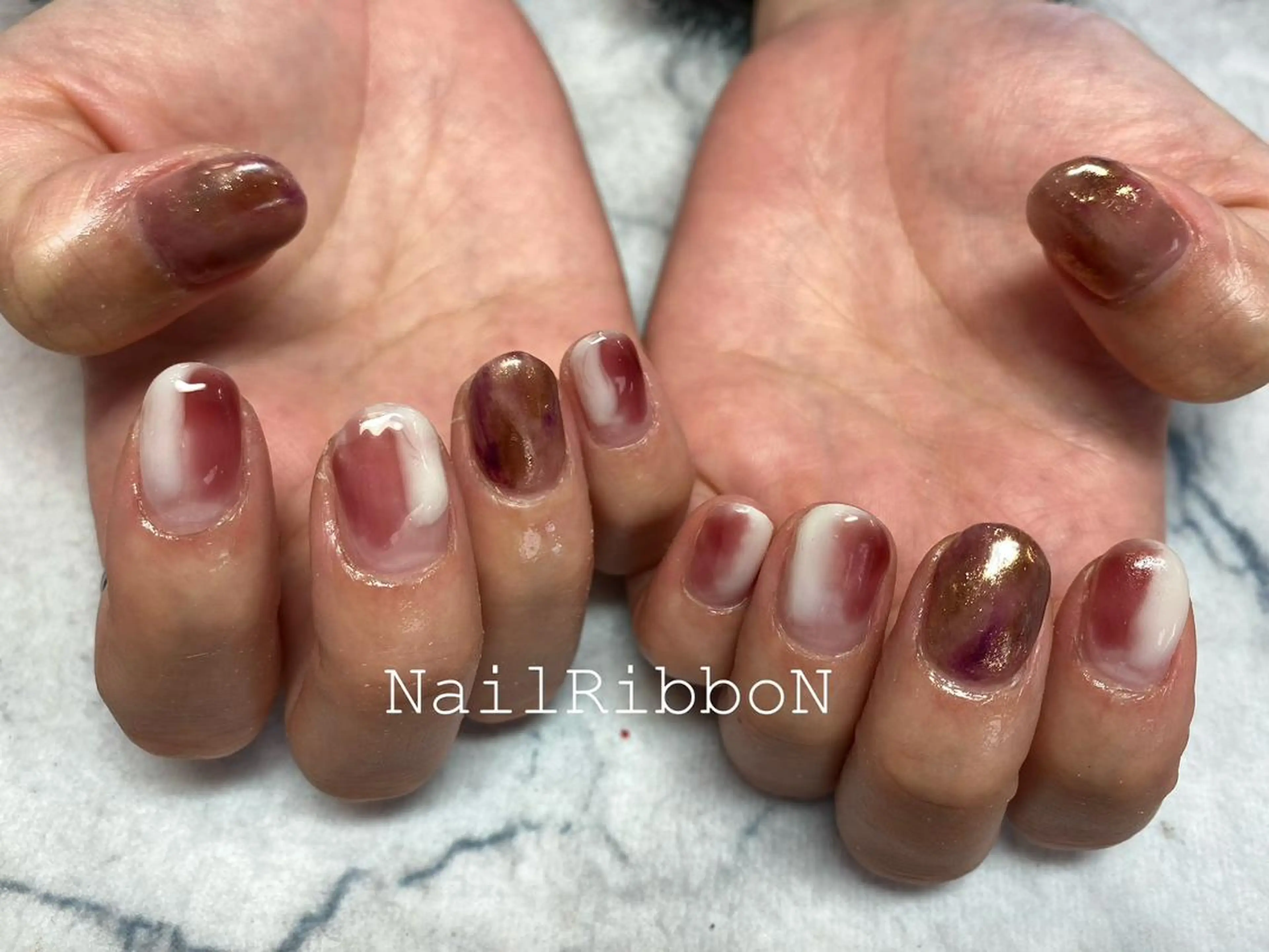 ネイル ネイルリボン 受付スタッフのネイルデザイン