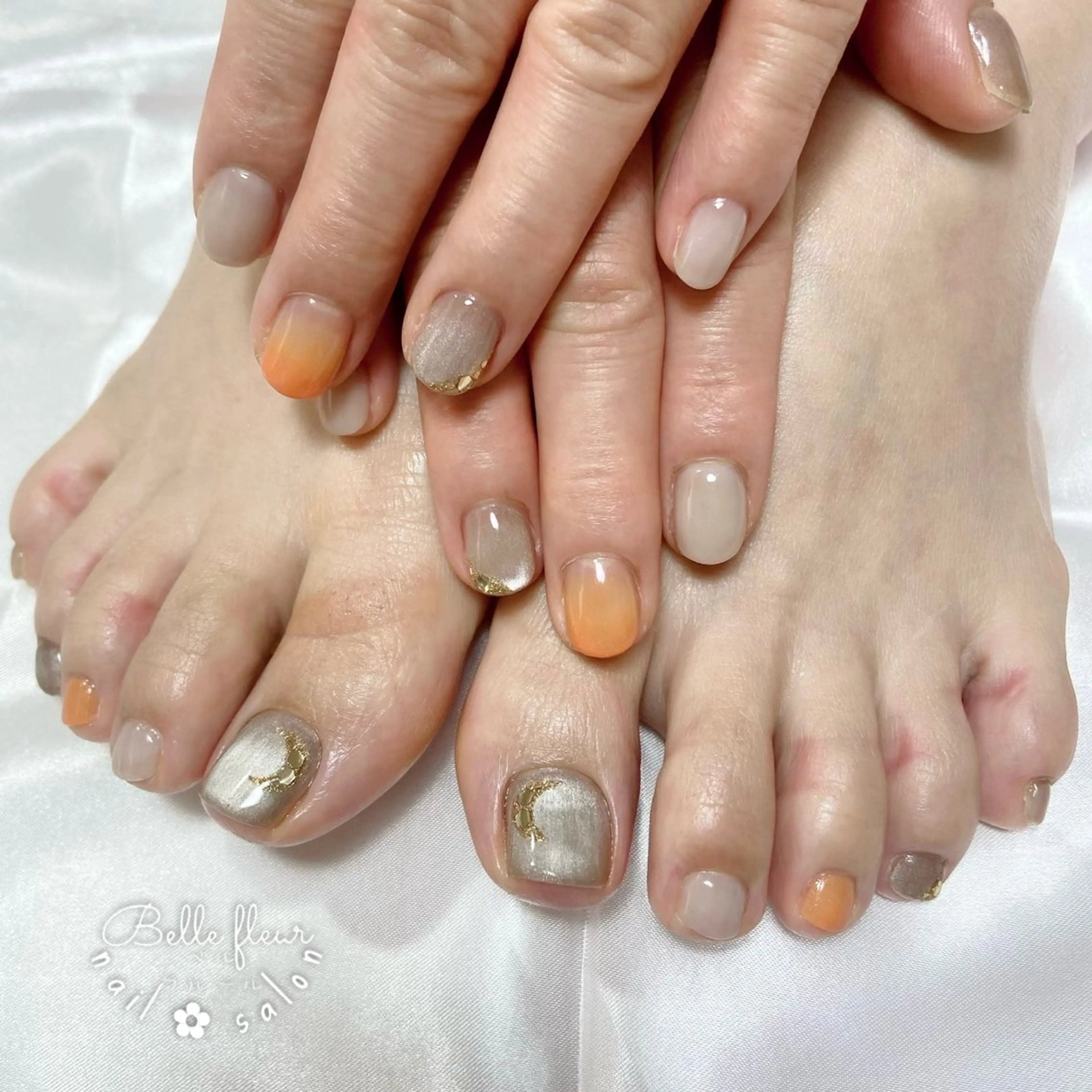 ネイル フットネイル おそろいネイル オレンジ ﾈｲﾙｻﾛﾝ Bellefleurのネイルデザイン