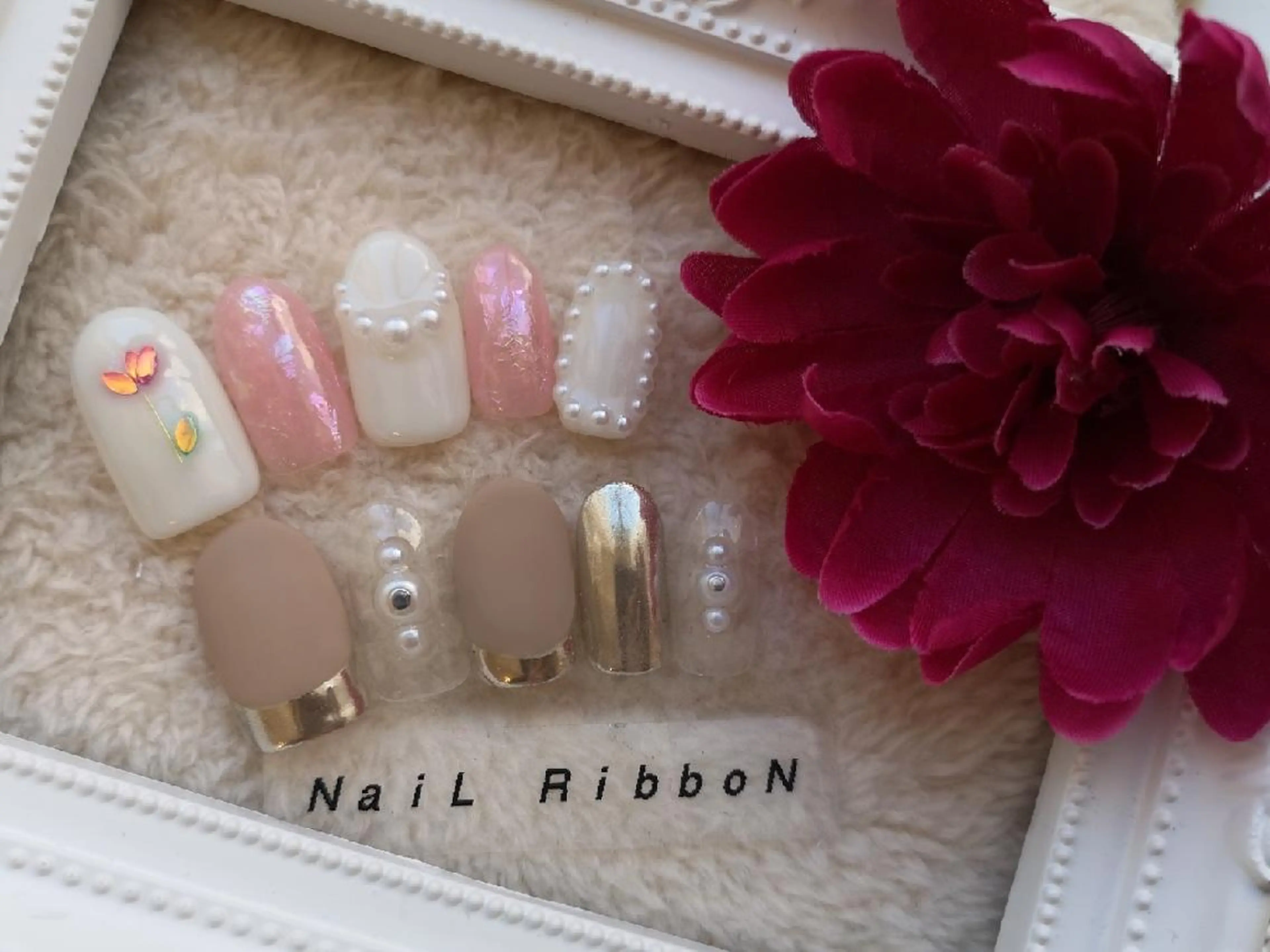 ネイル ネイルリボン 受付スタッフのネイルデザイン