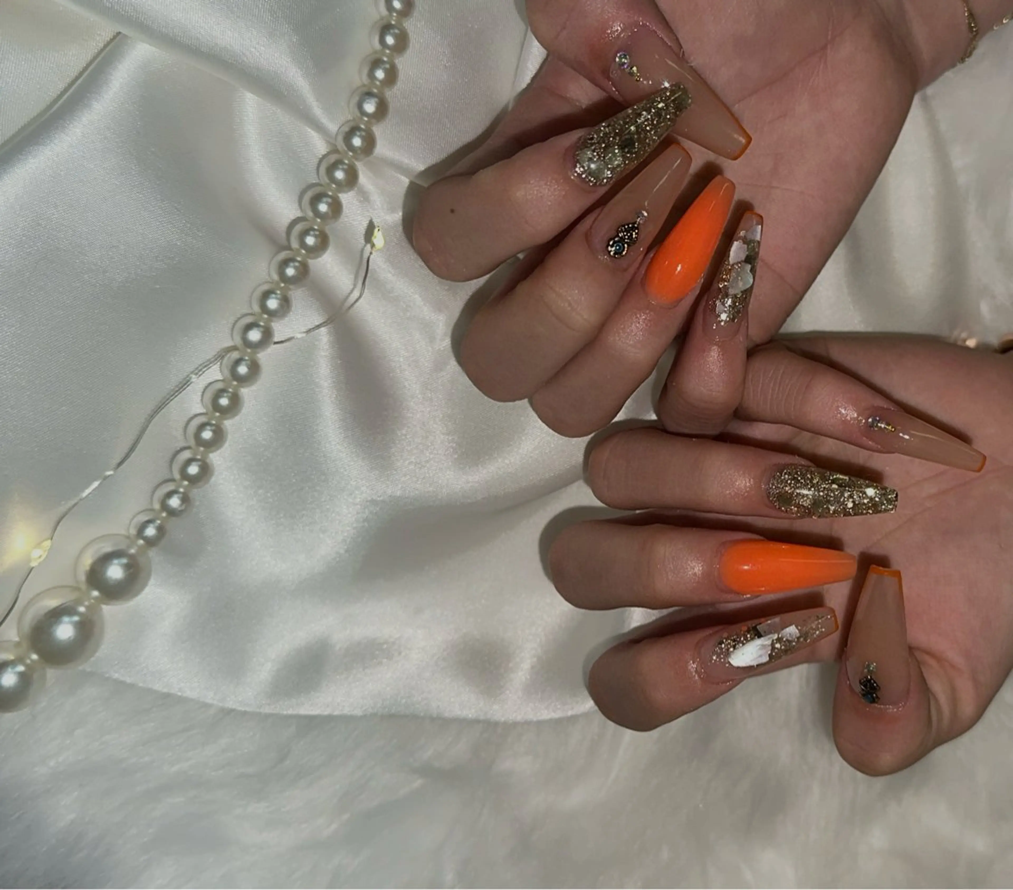 ネイル オレンジ Nailsalon SKiのネイルデザイン