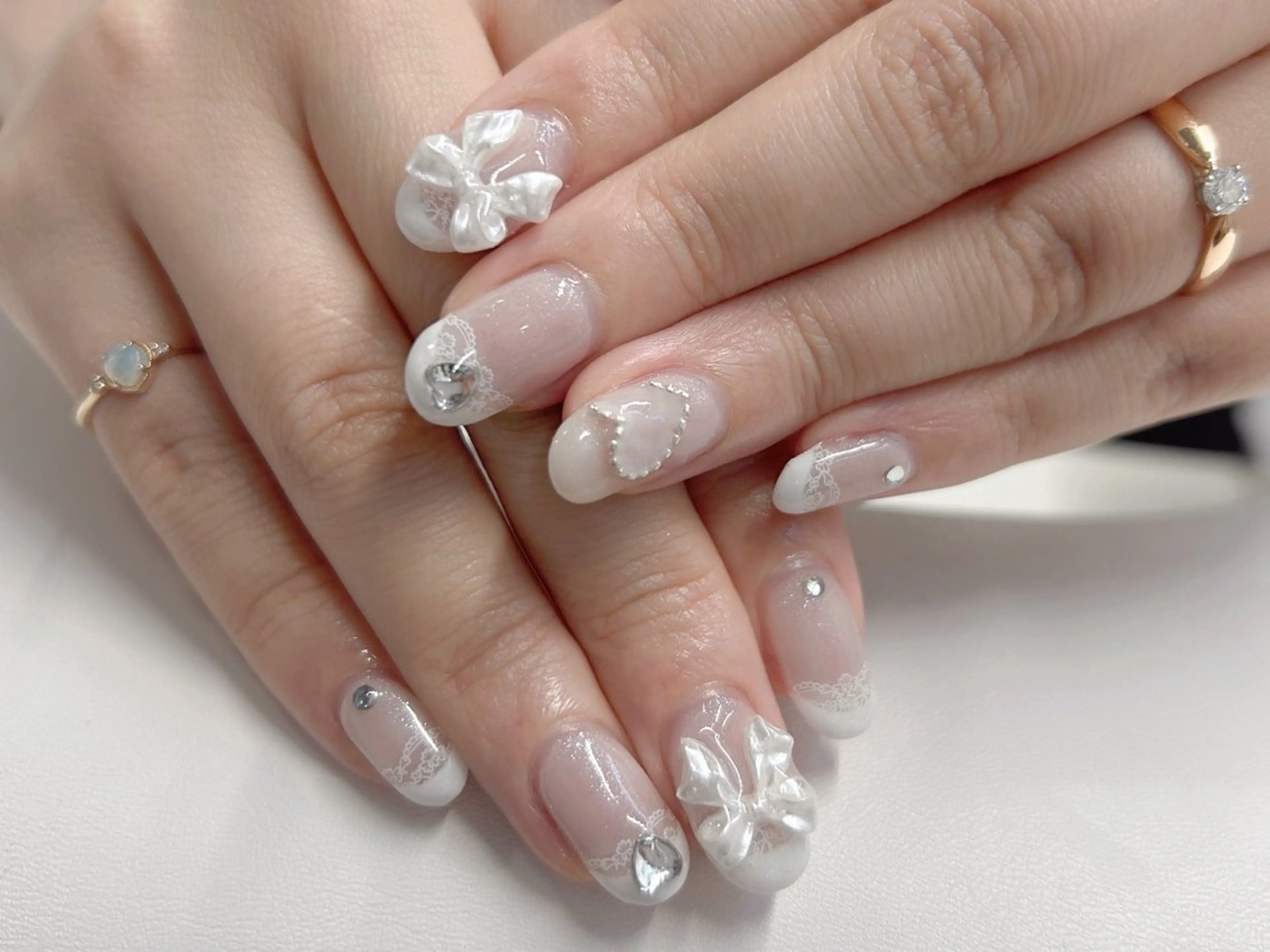 ネイル 桜ネイル フレンチネイル ガーリー ハート レース ハンドネイル Forca total studio所属・Forca Airaのネイルデザイン